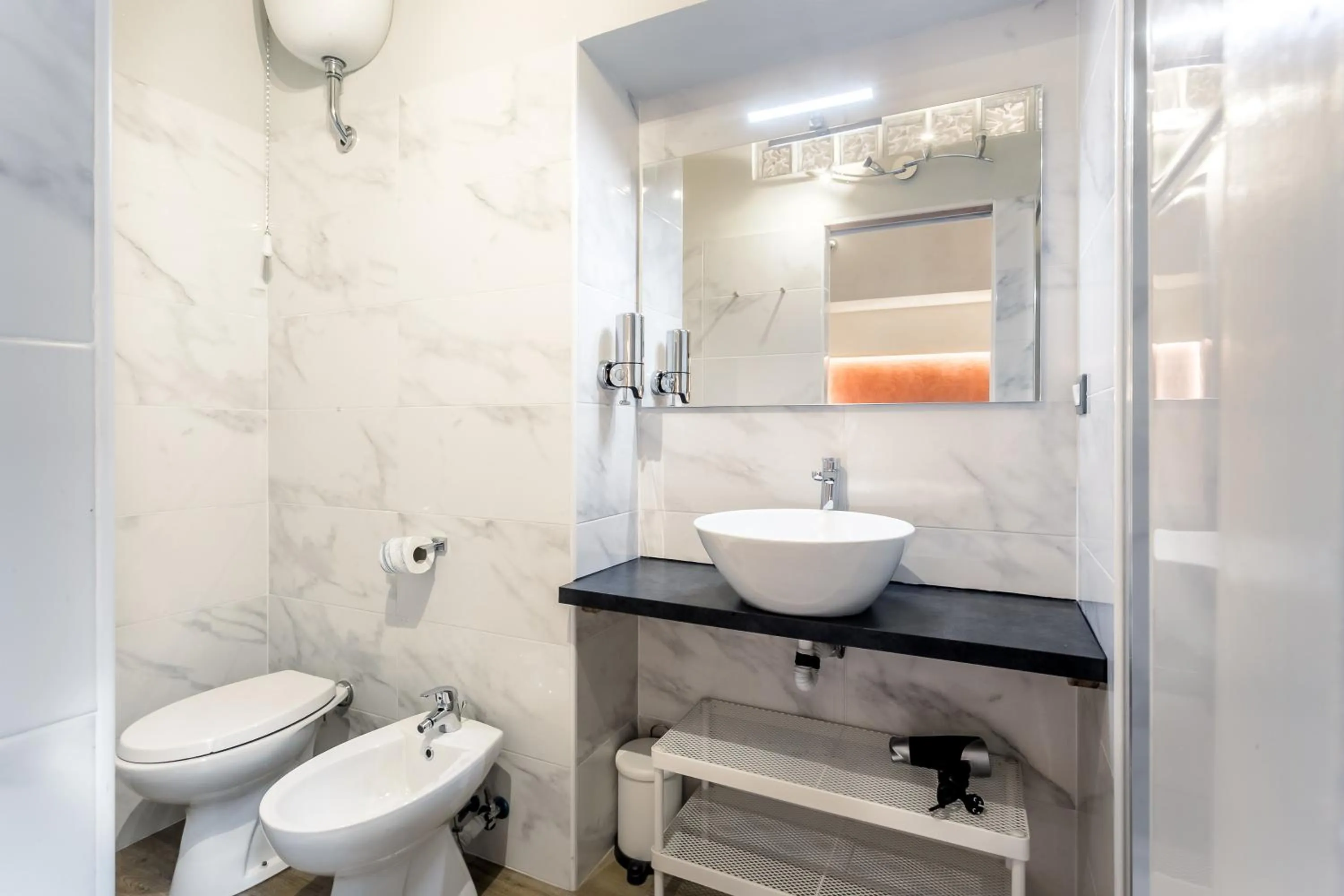 Toilet in AmoRoma Suite