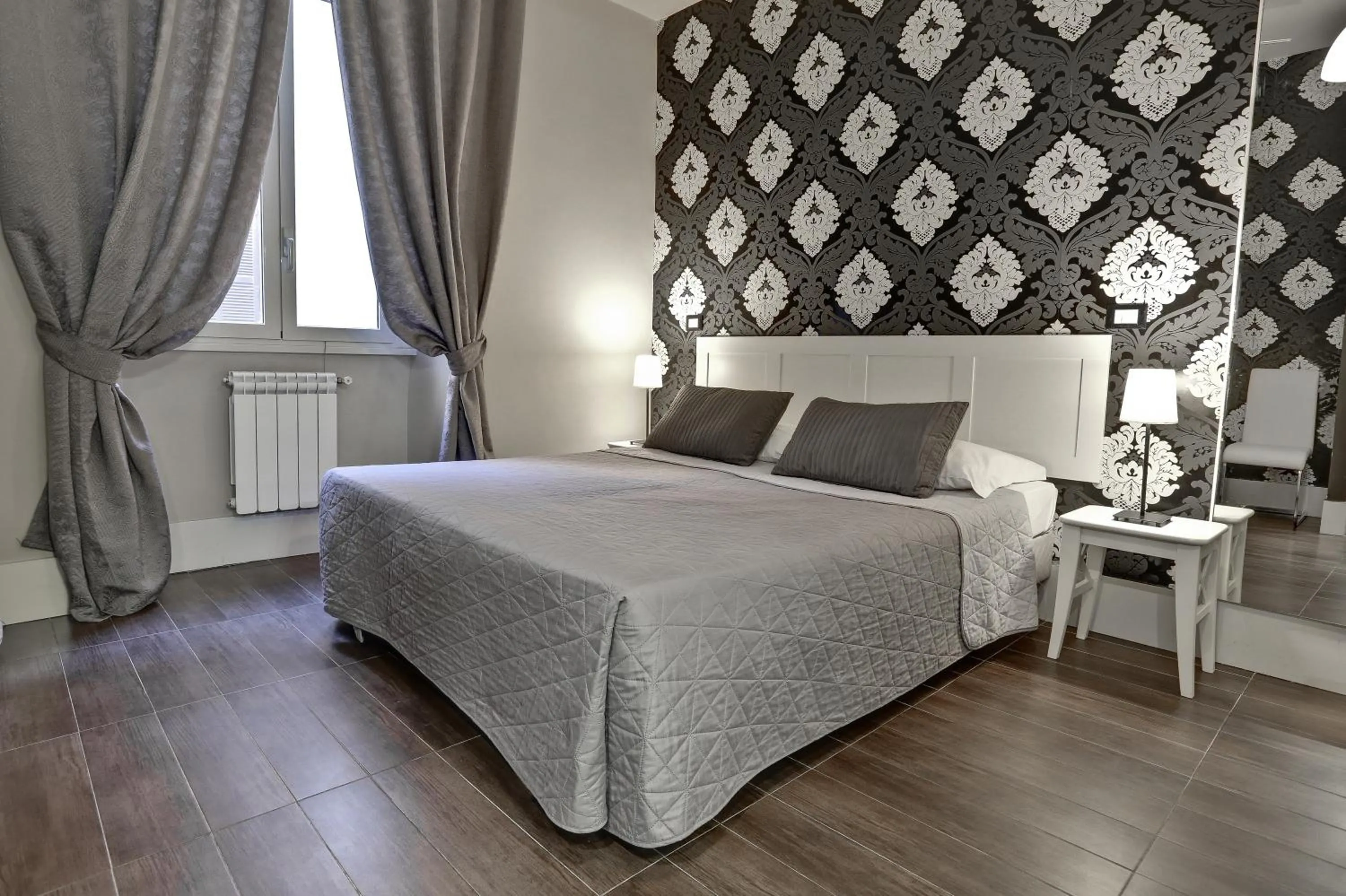 Bed in AmoRoma Suite