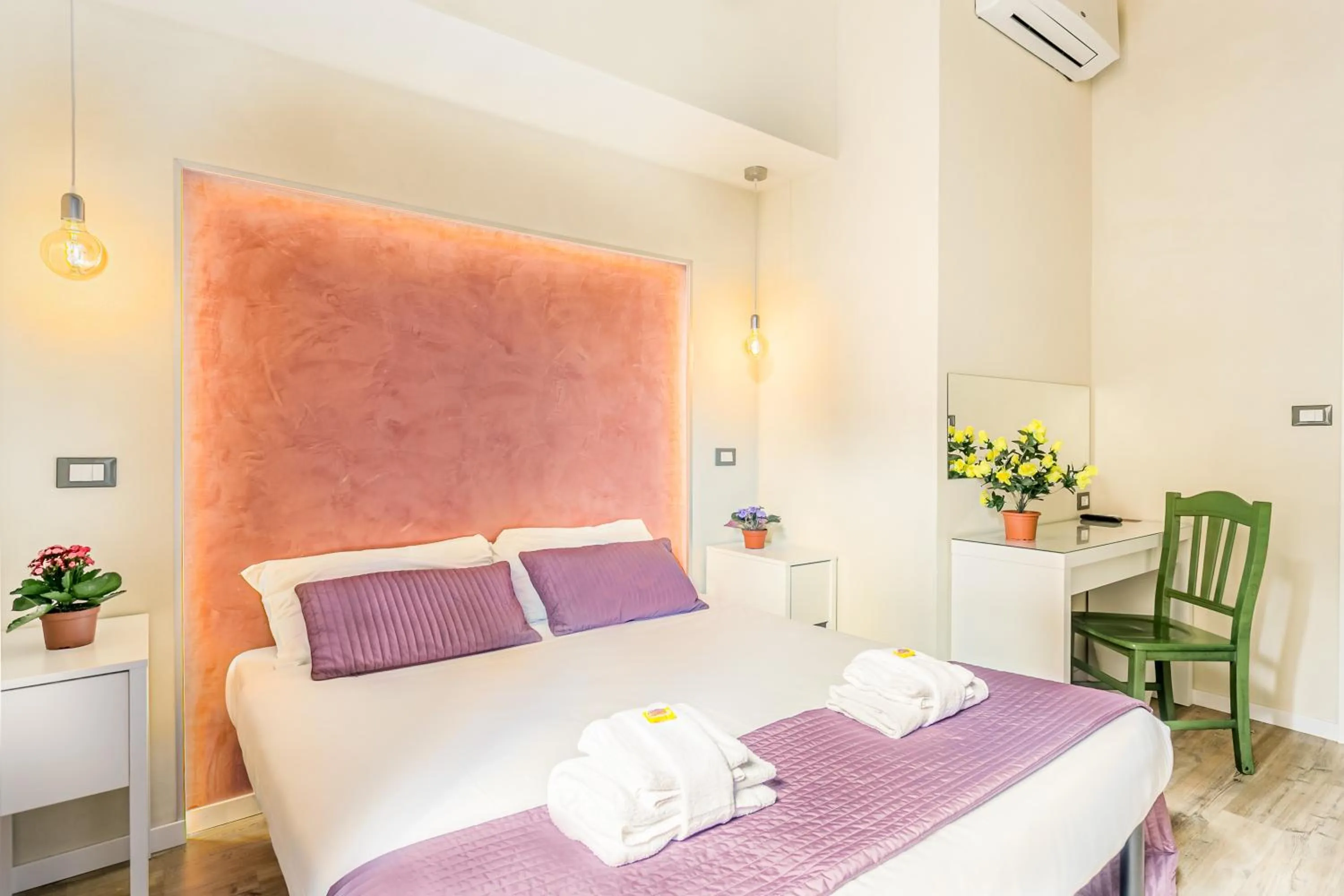 Bed in AmoRoma Suite