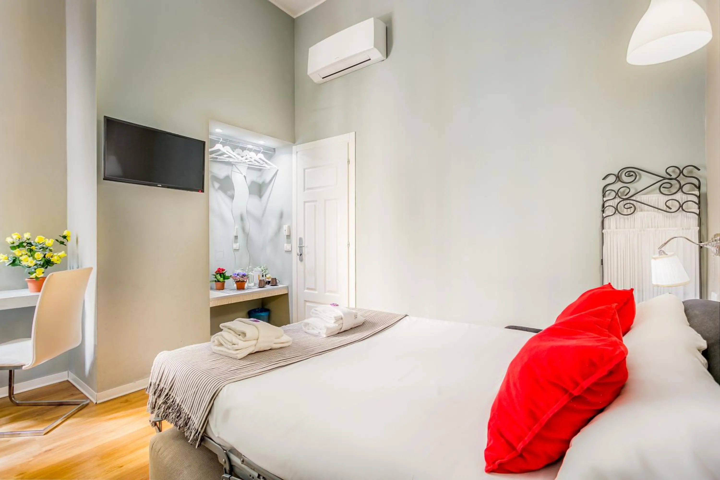 Bed in AmoRoma Suite