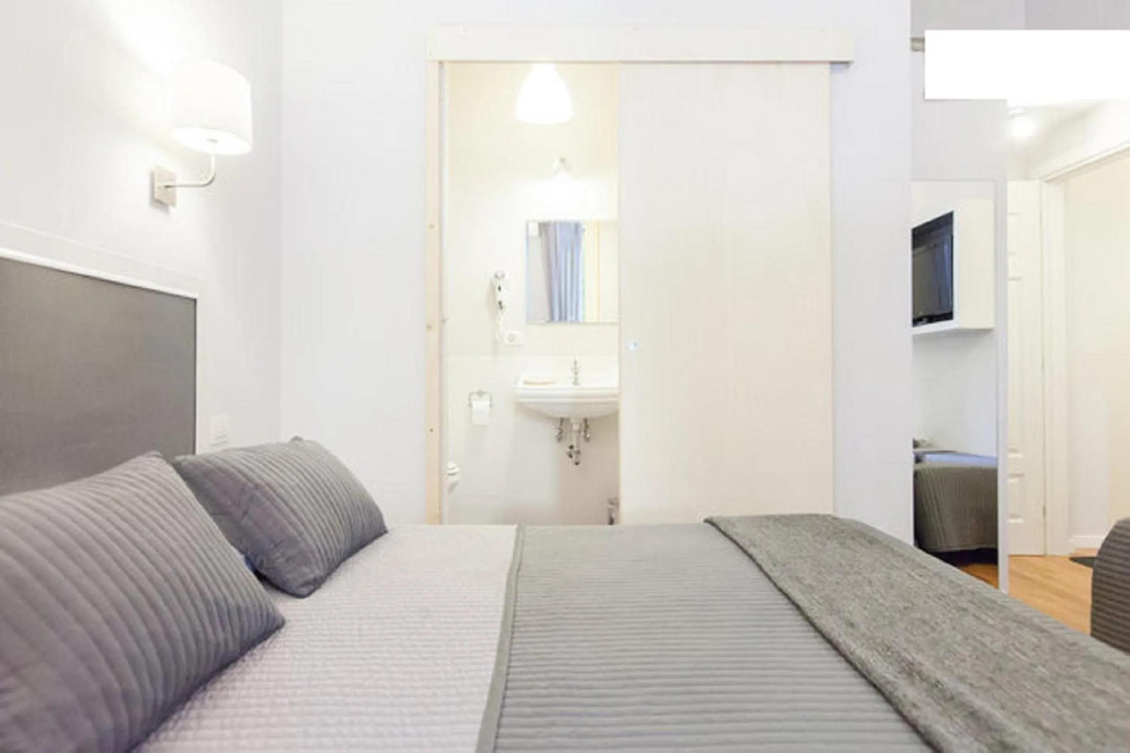 Bed in AmoRoma Suite