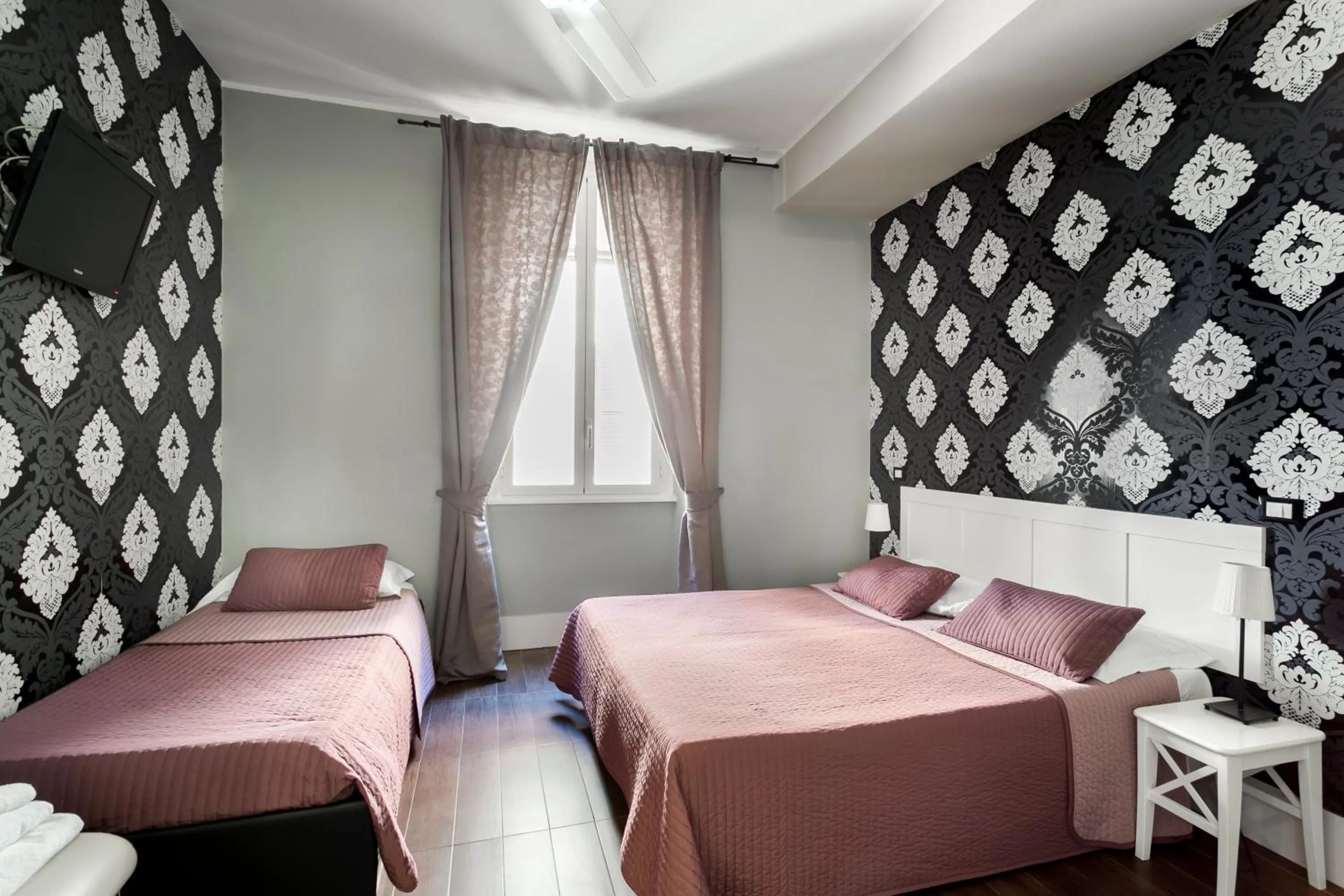 Bed in AmoRoma Suite