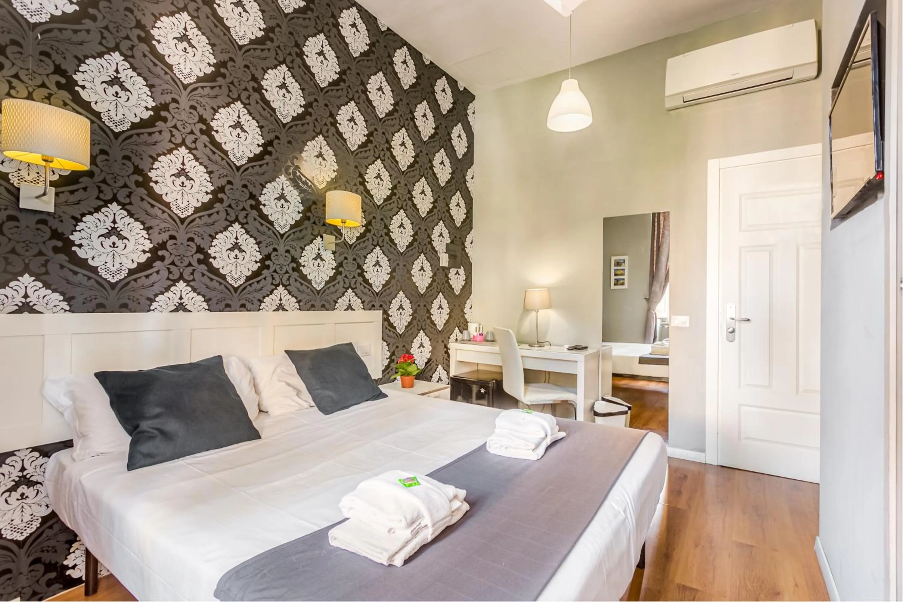 Bed in AmoRoma Suite