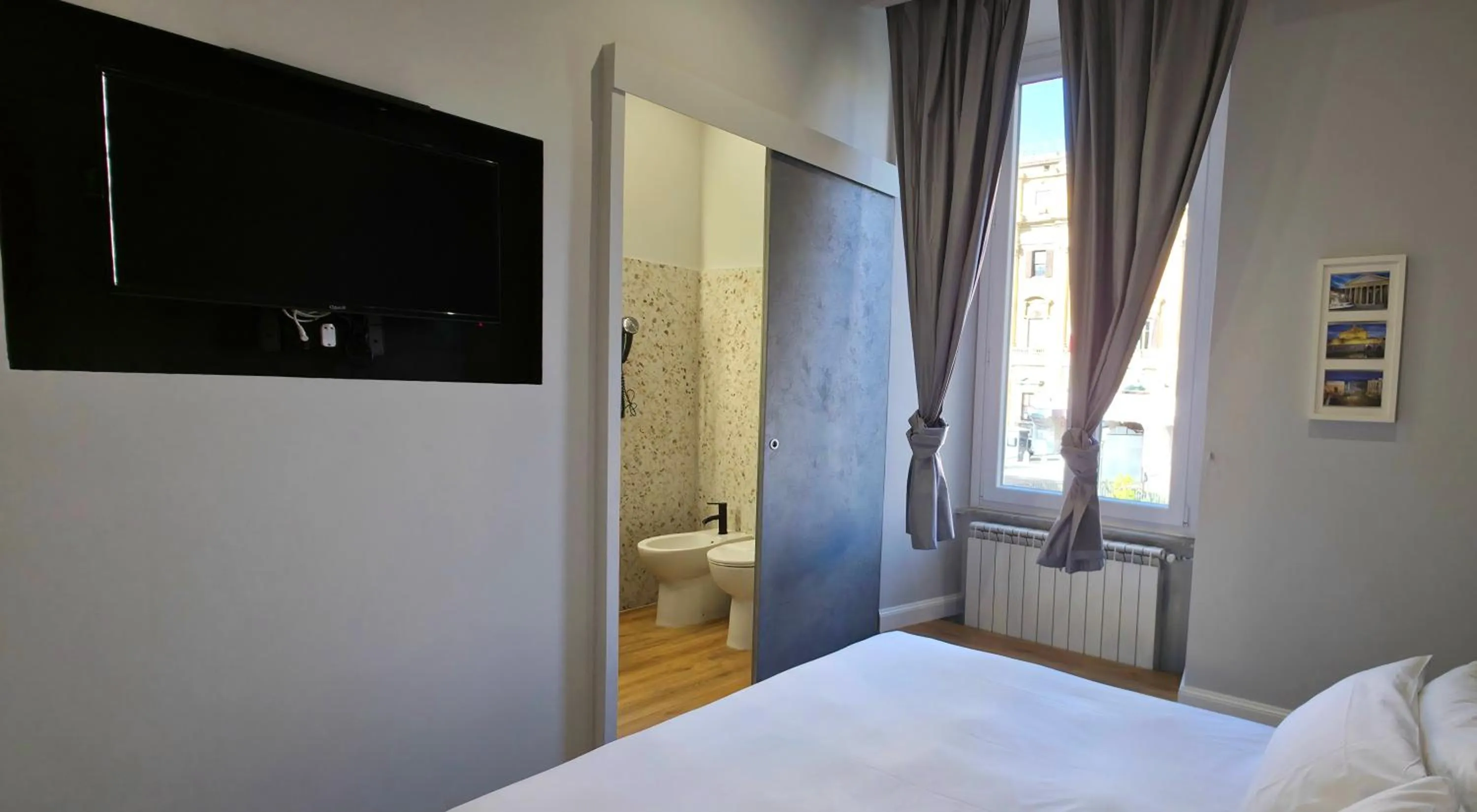 Bed in AmoRoma Suite