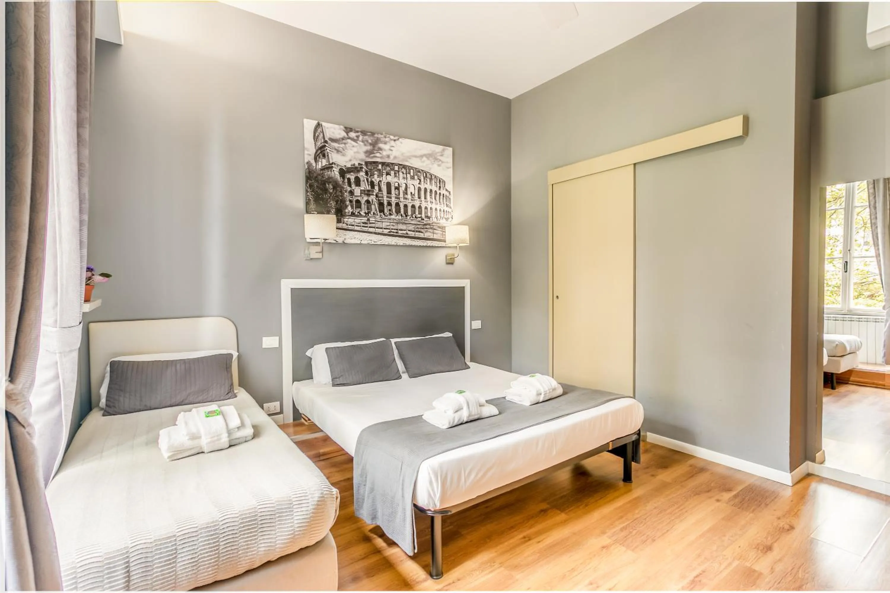 Bed in AmoRoma Suite