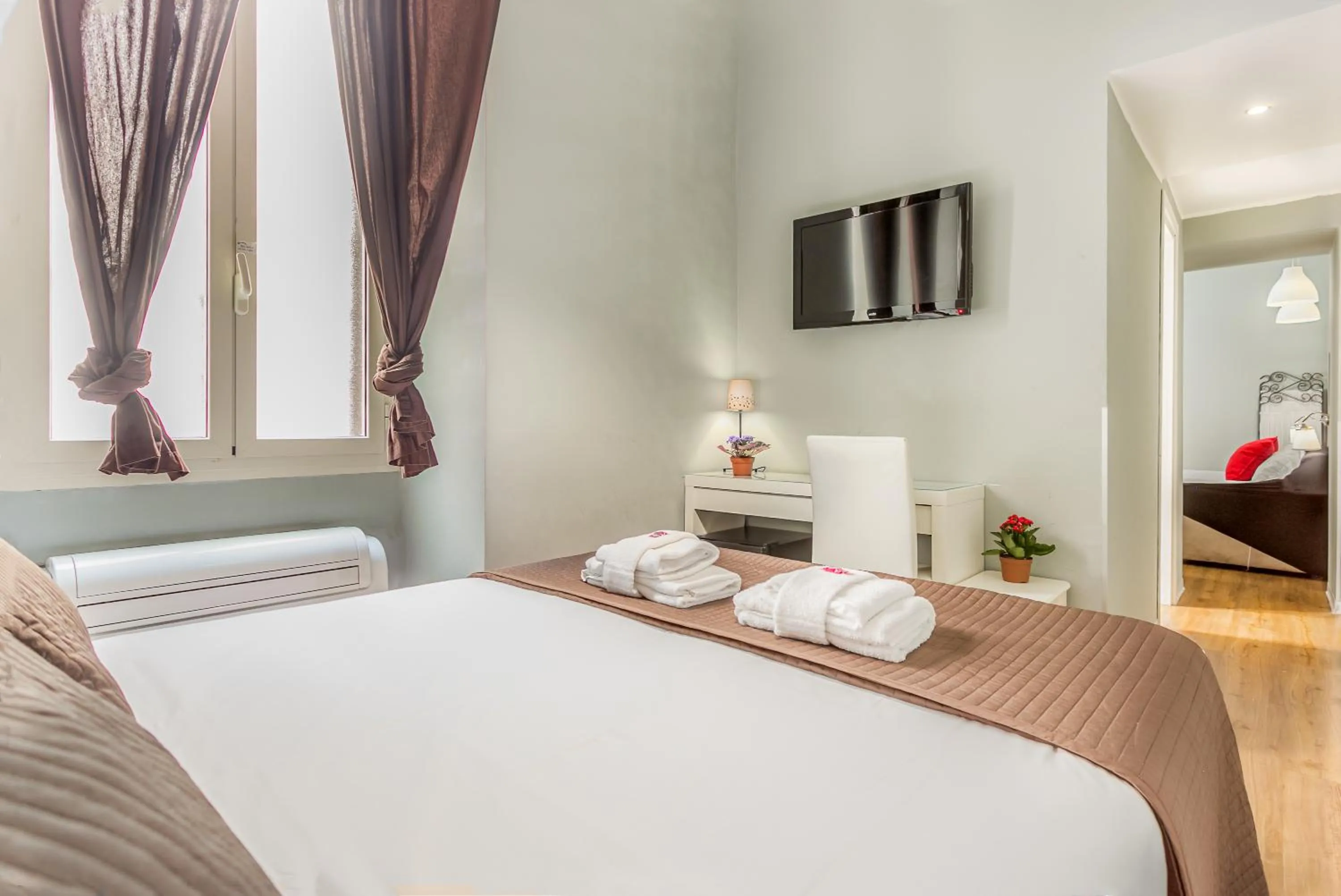 Bed in AmoRoma Suite