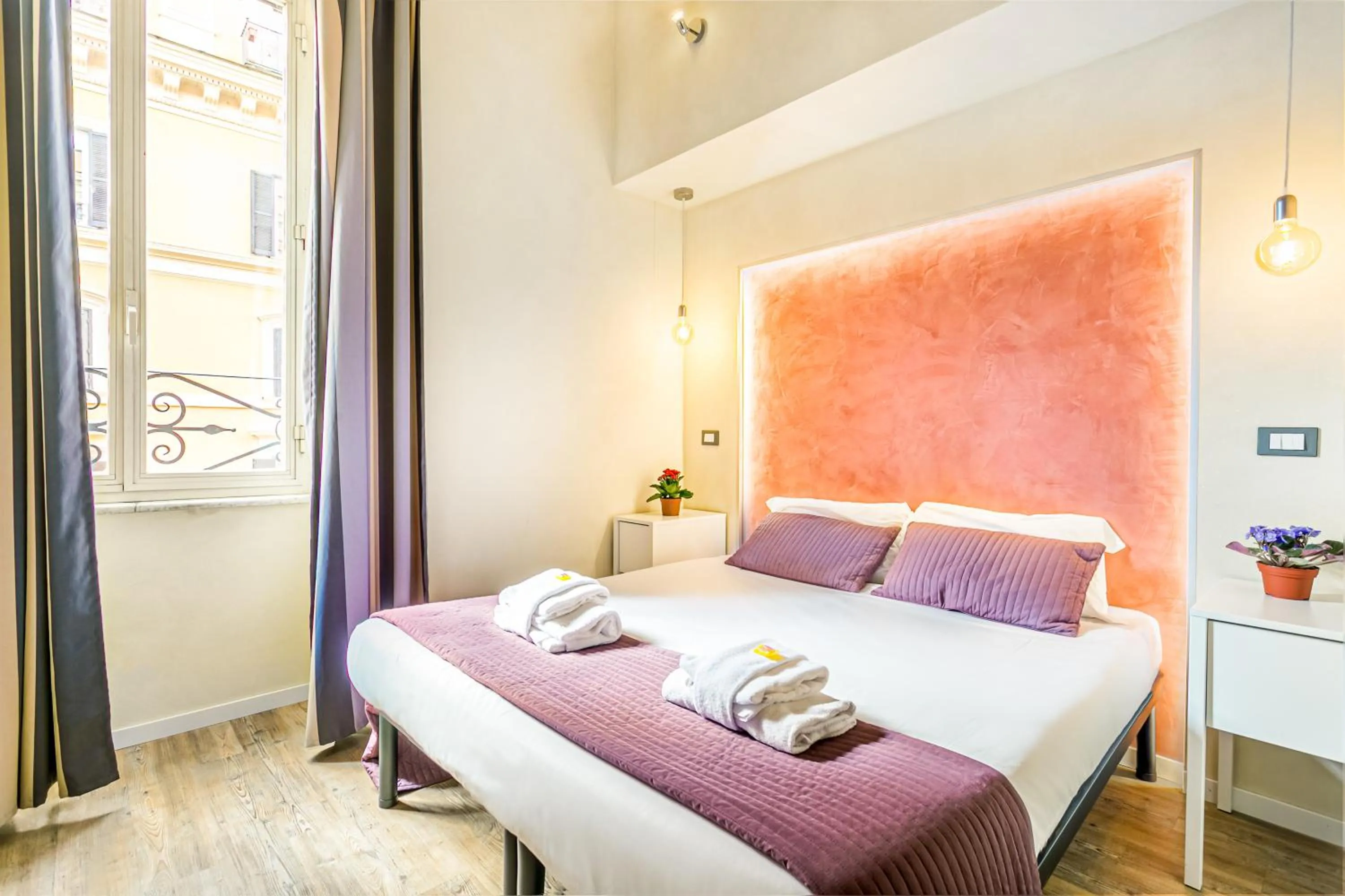 Bed in AmoRoma Suite