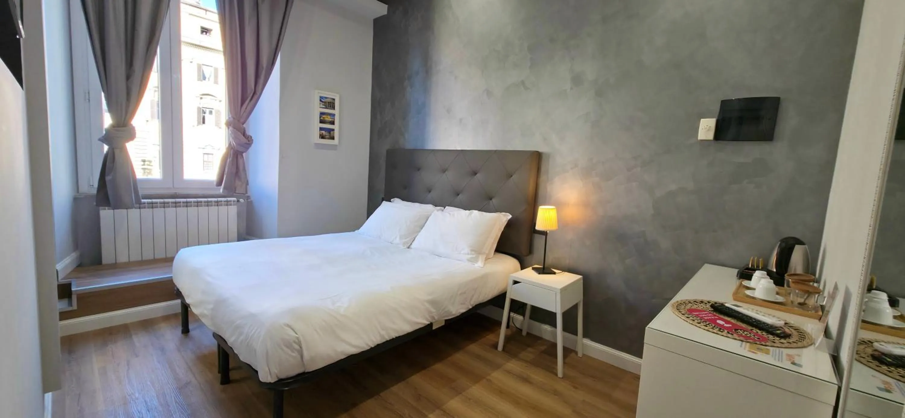 Bed in AmoRoma Suite