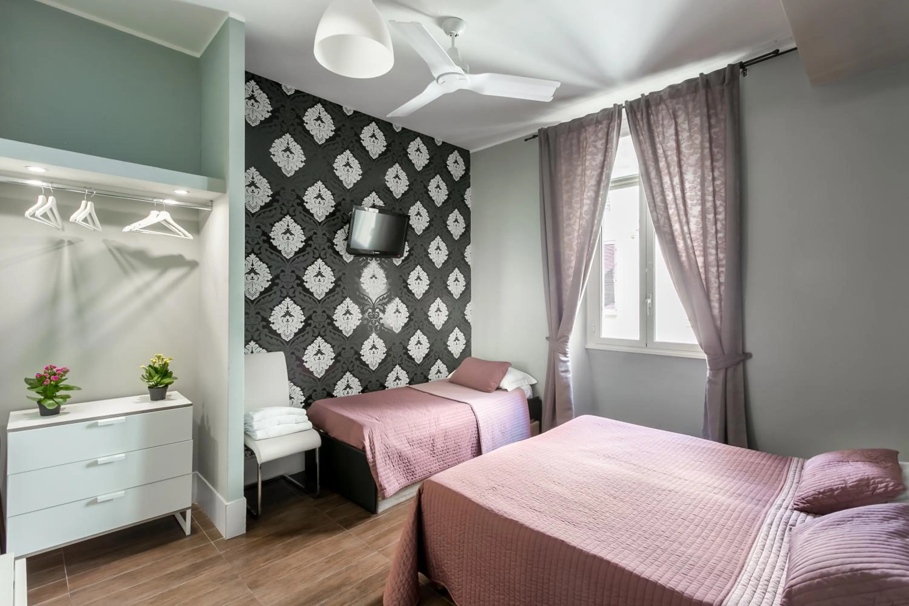 Bed in AmoRoma Suite