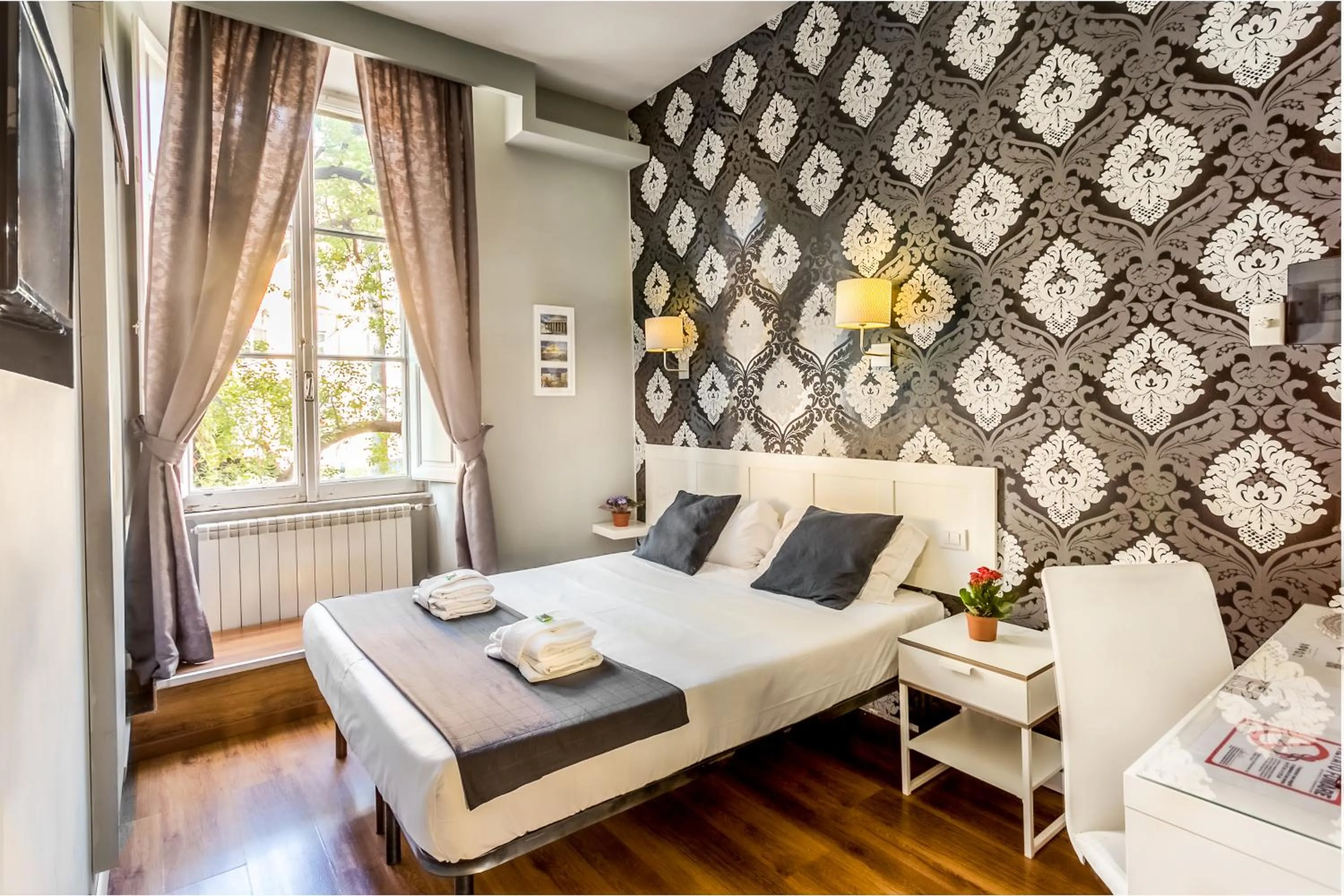 Bed in AmoRoma Suite