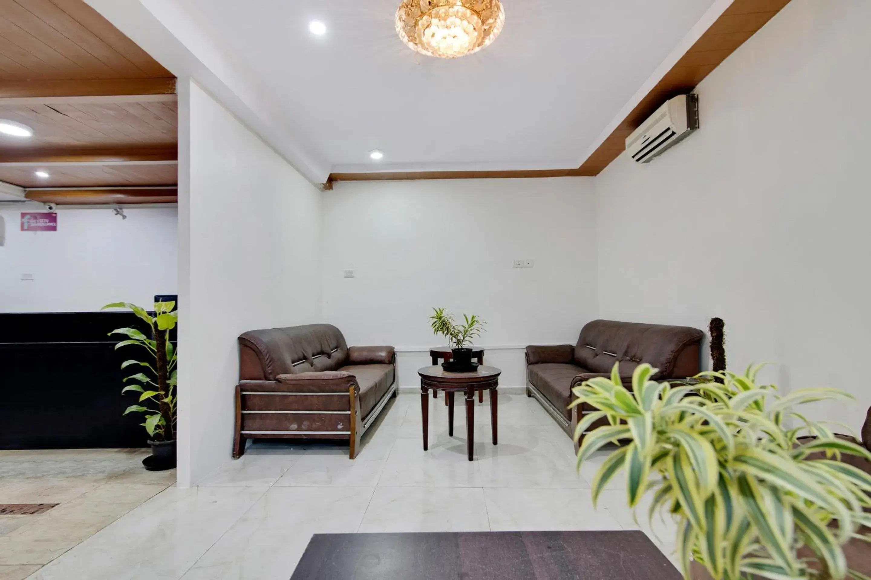 Lobby or reception in Capital O Elegant Amethyst Business Hotel Near Ragigudda Sri Prasanna Anjaneyaswamy Temple Lobby or reception in Capital O Elegant Amethyst Business Hotel Near Ragigudda Sri Prasanna Anjaneyaswamy Temple