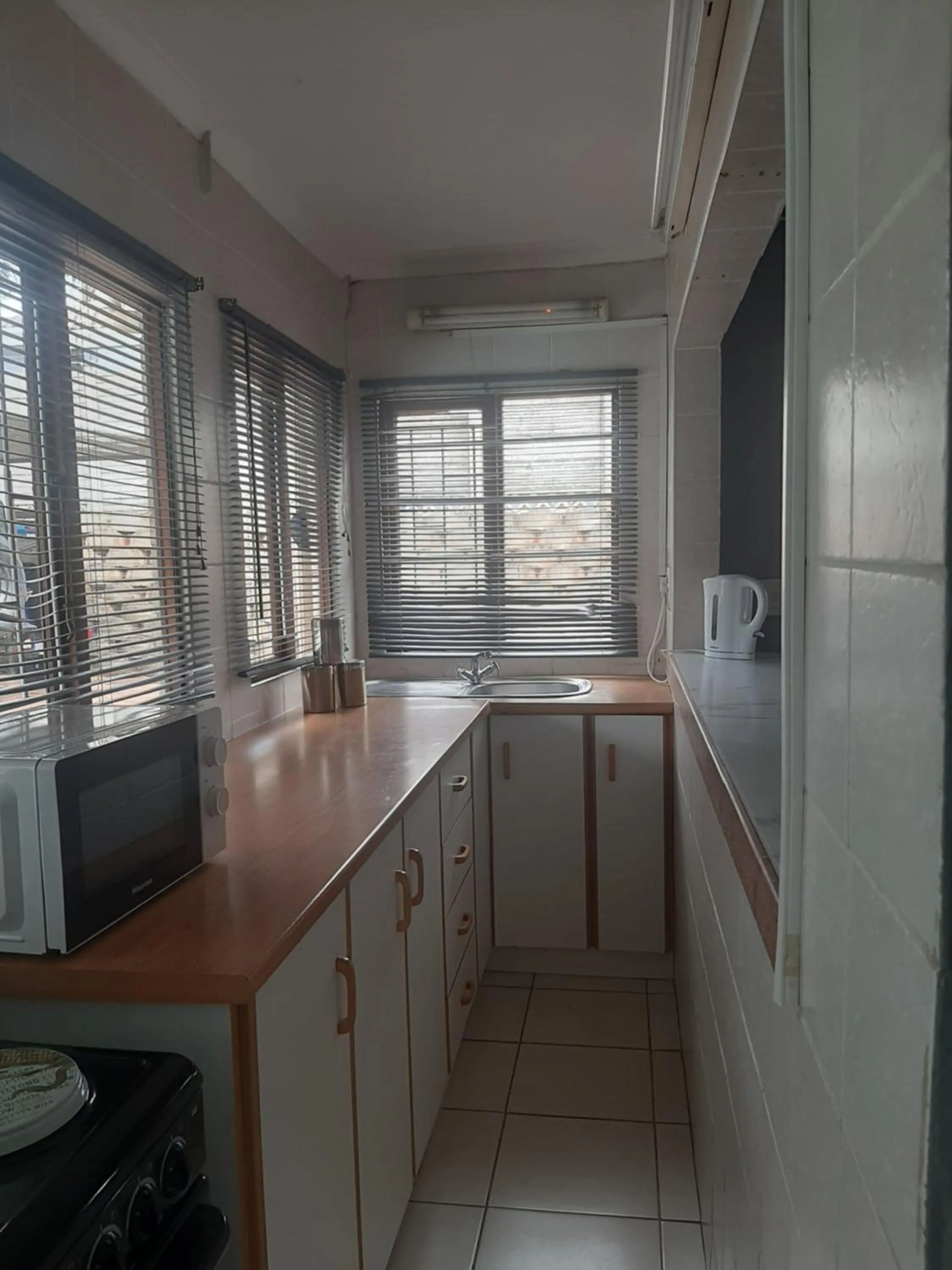 Kitchen or kitchenette in Bougainvillea BNB