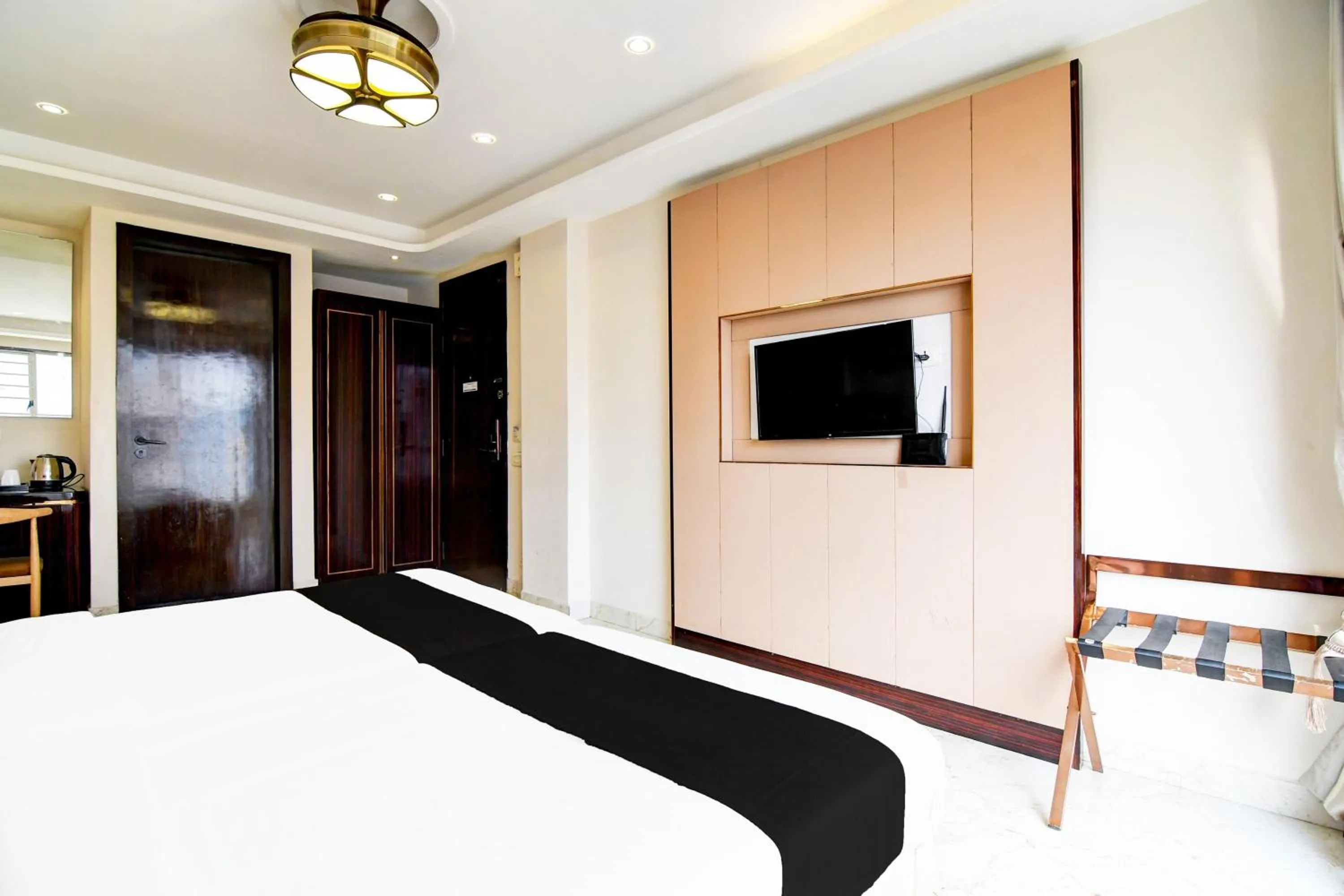 Bedroom, Bed in Super Townhouse New Town Formerly Krish Residency