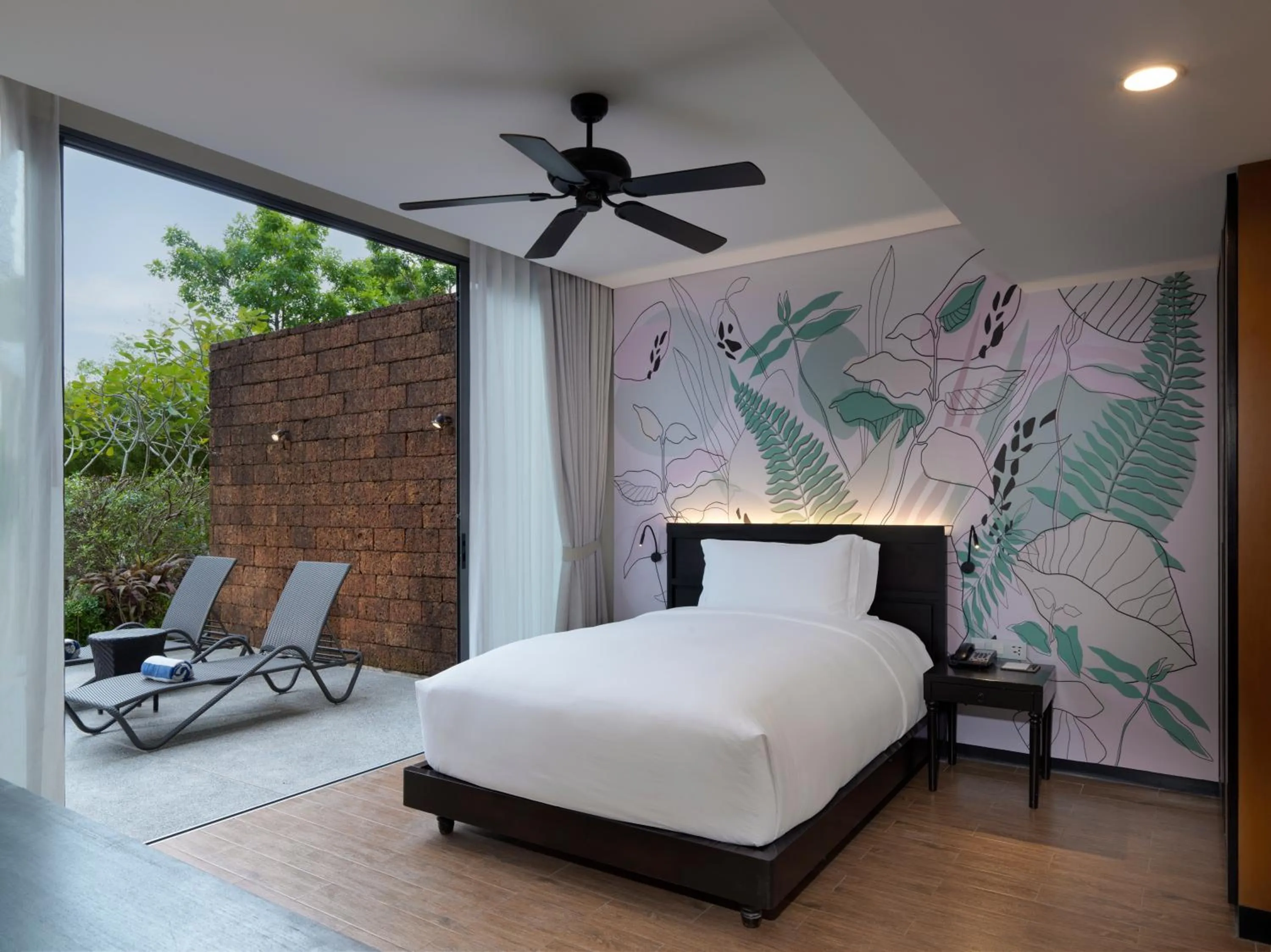 Bed in Avani Plus Mai Khao Phuket Suites