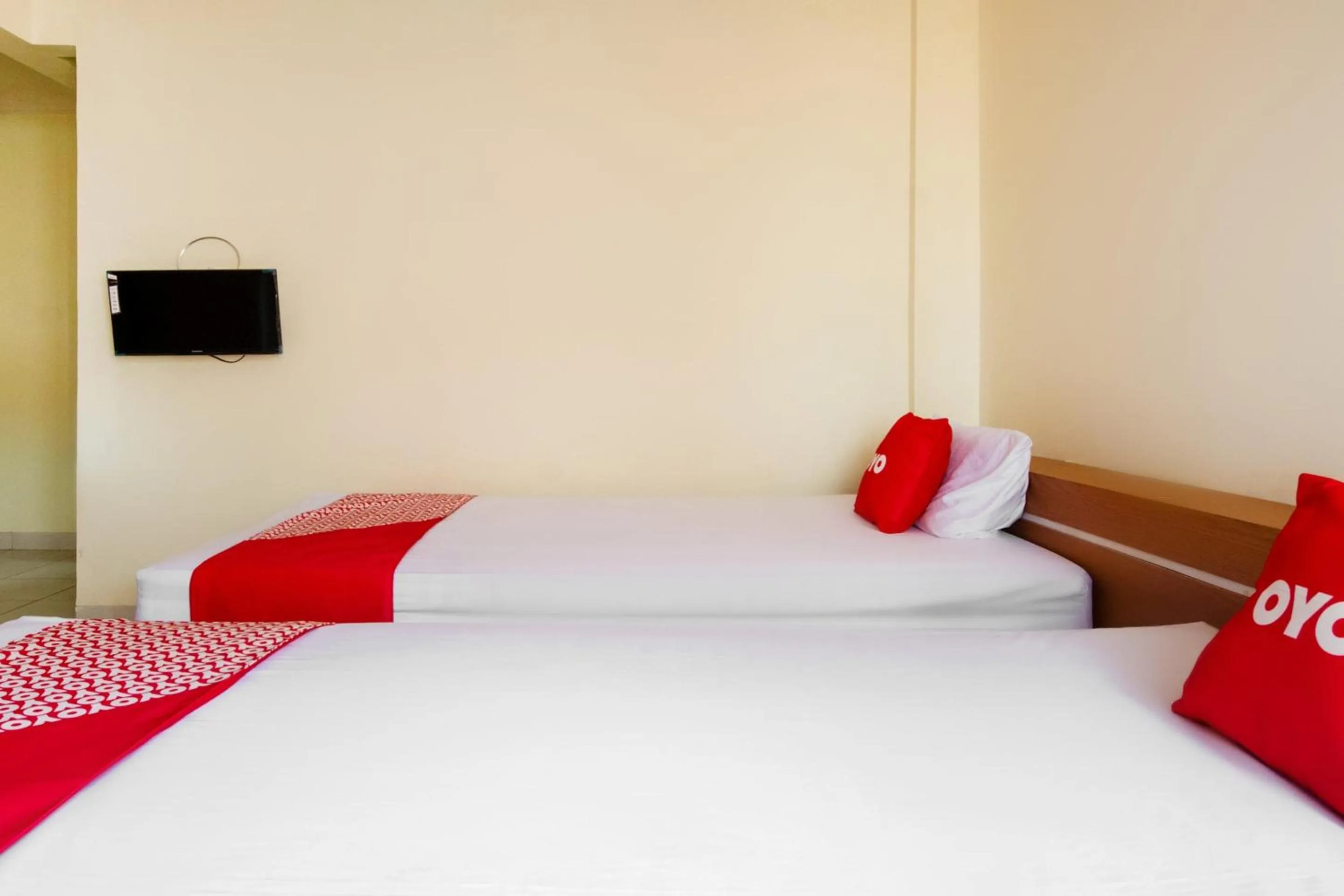 Bedroom in OYO 2025 Wisma Musdalifa