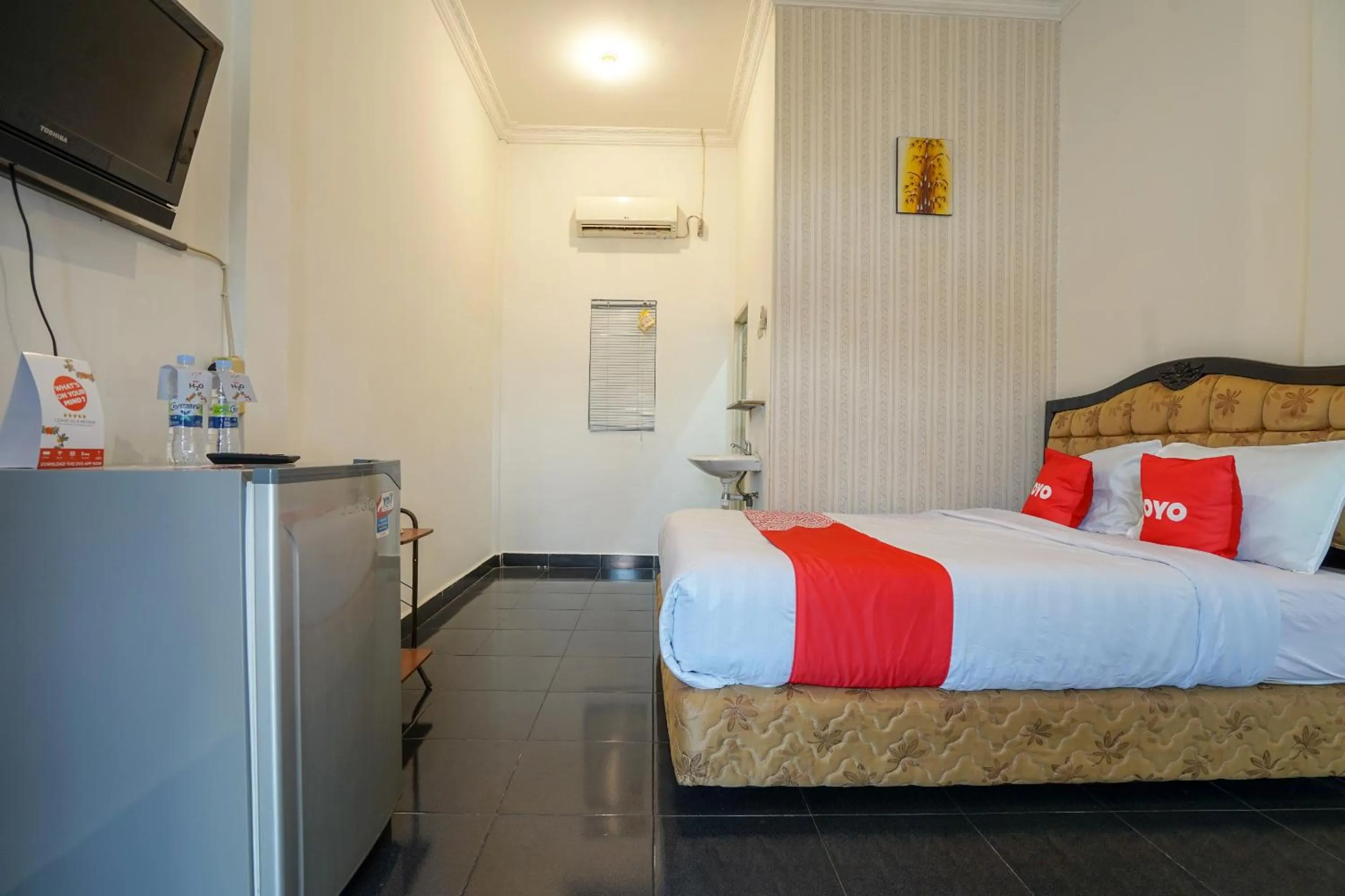 Bedroom in OYO 2036 Afifah Homestay Syariah