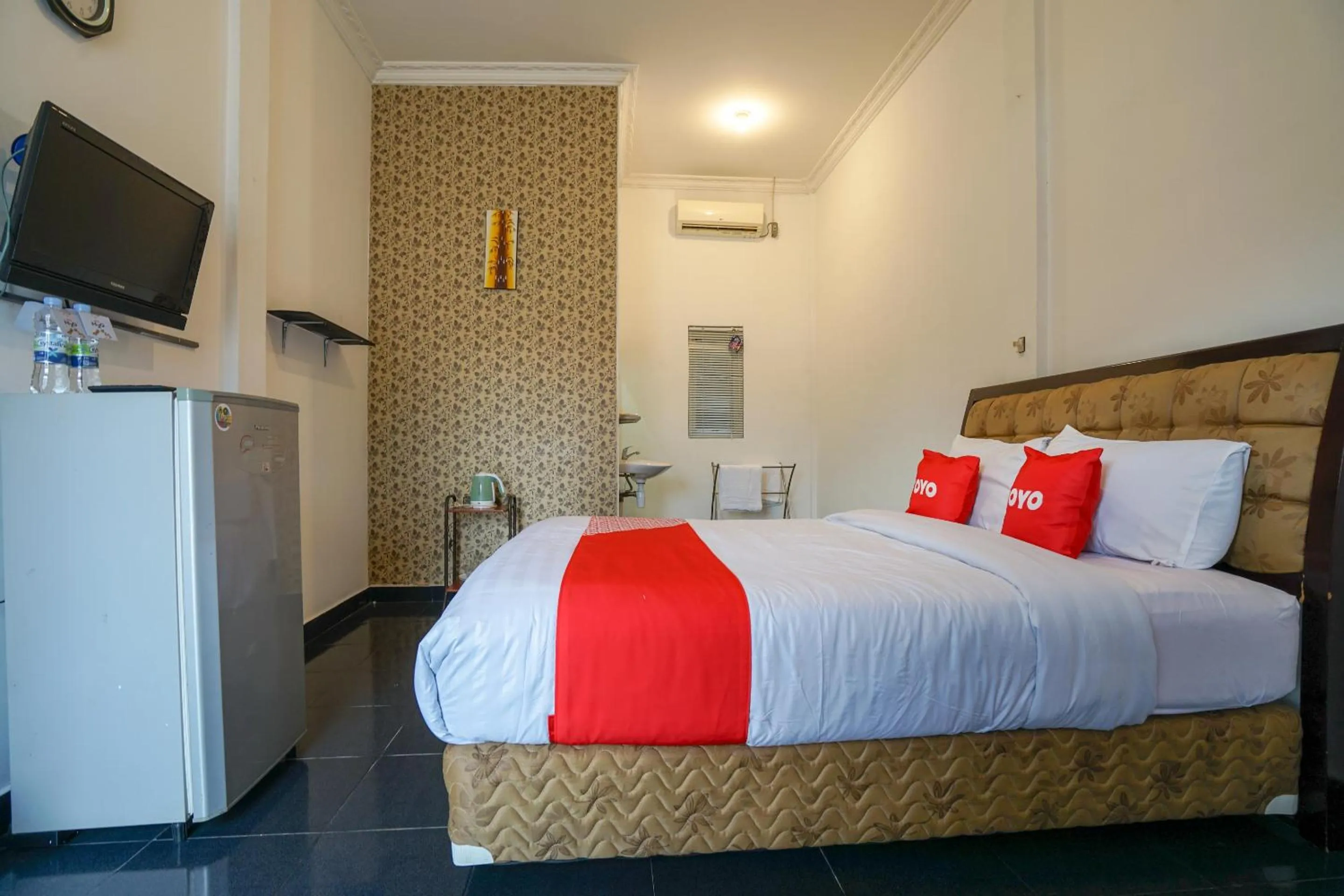 Bedroom in OYO 2036 Afifah Homestay Syariah