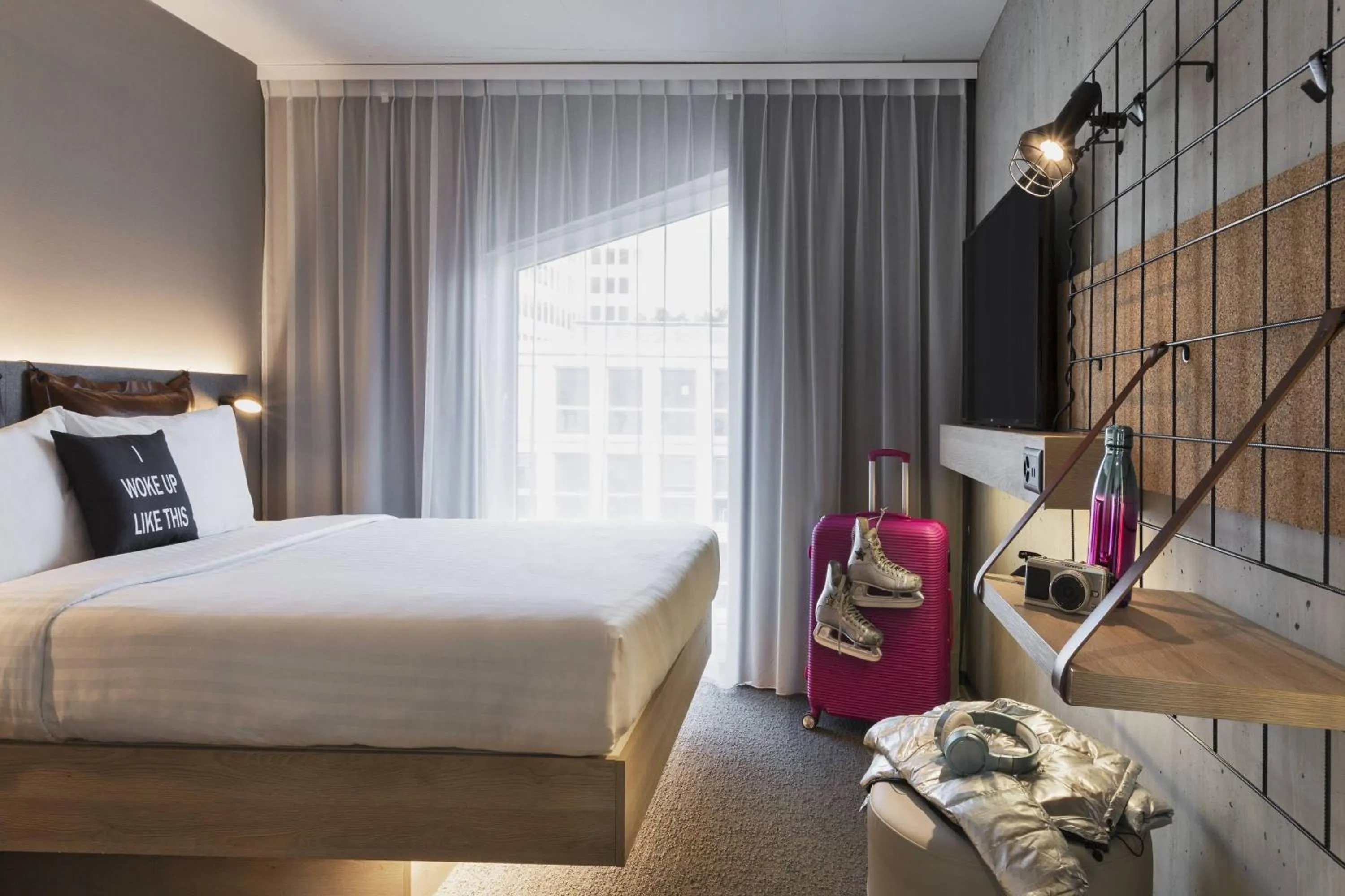 Photo of the whole room, Bed in Moxy Lausanne City