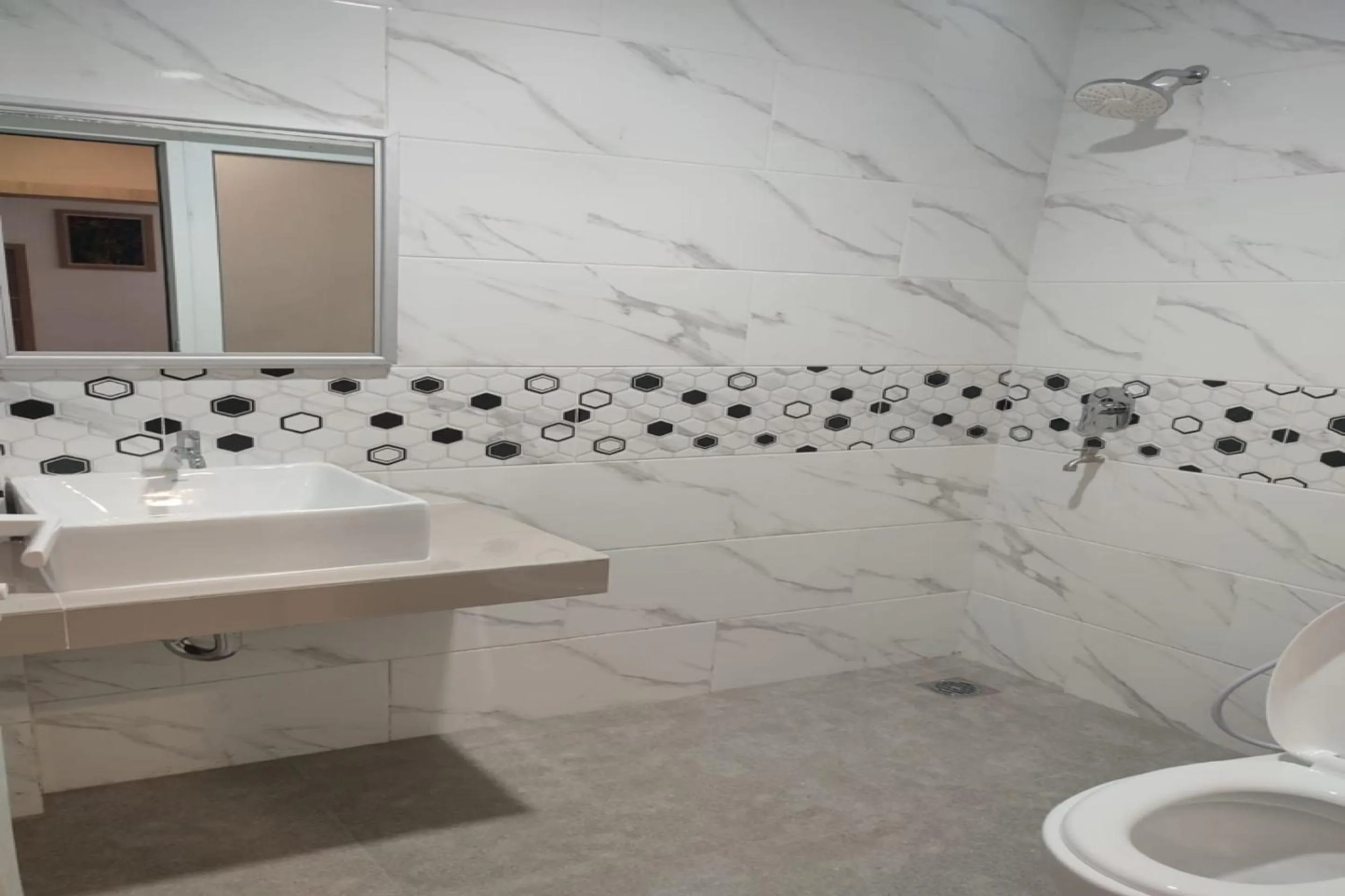 Bathroom in Capital O 2018 Ring Road Guest House Syariah