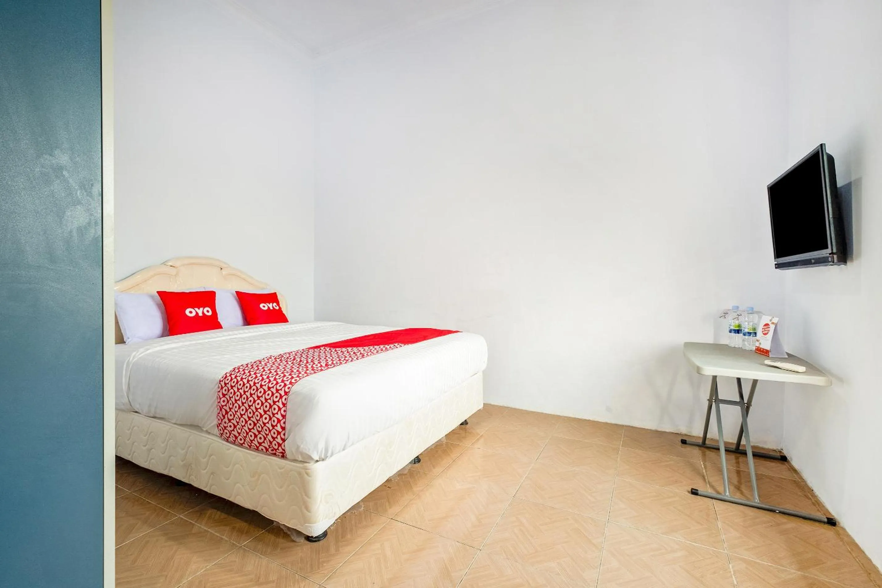 Bedroom in OYO 1906 Zhafira Guest House Syariah