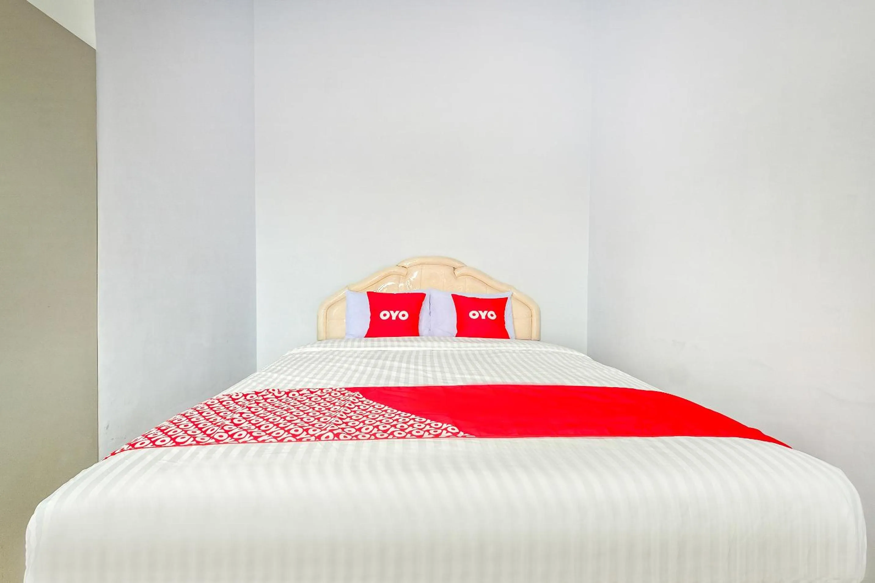 Bedroom in OYO 1906 Zhafira Guest House Syariah