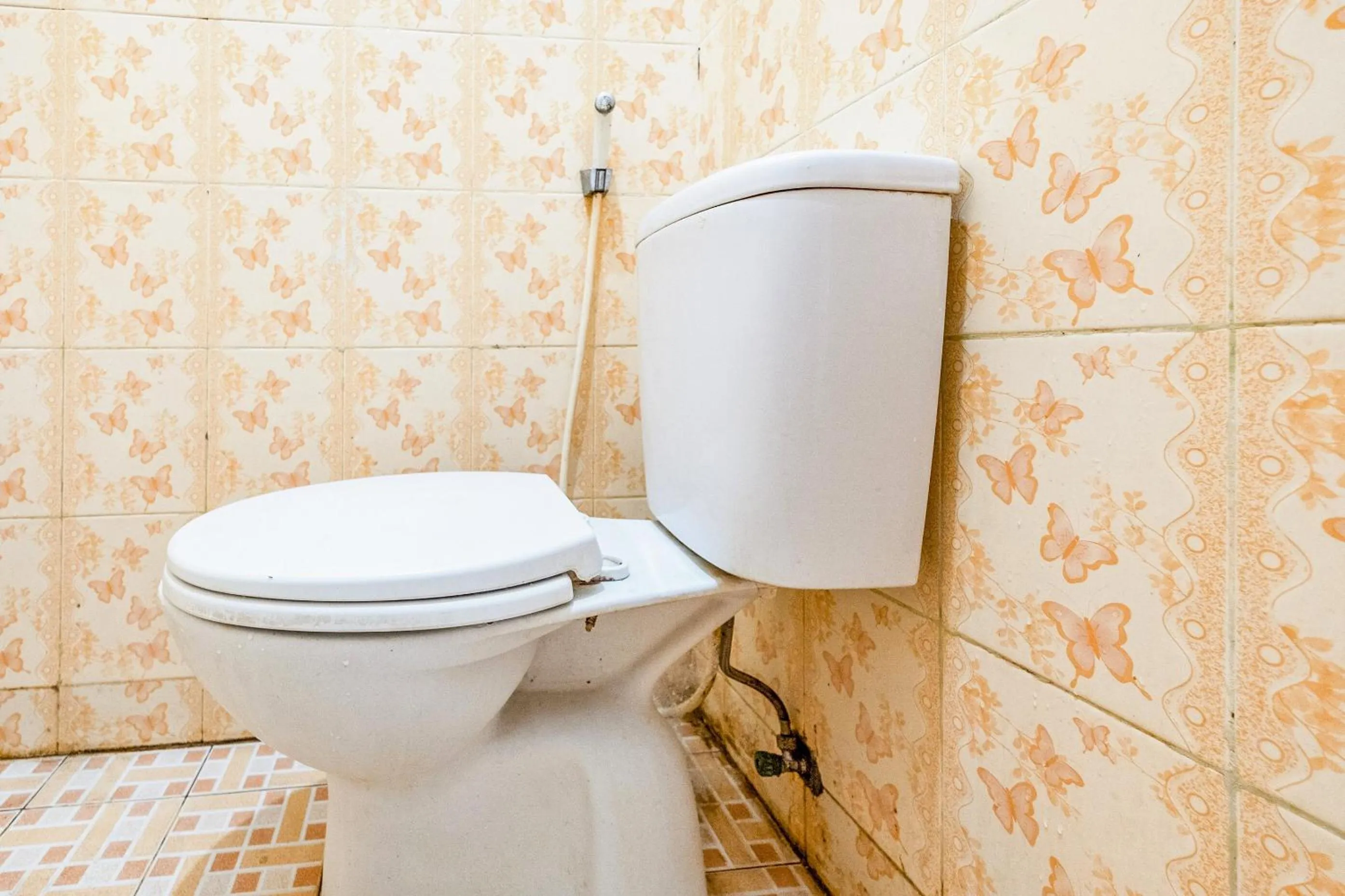 Bathroom in OYO 1906 Zhafira Guest House Syariah