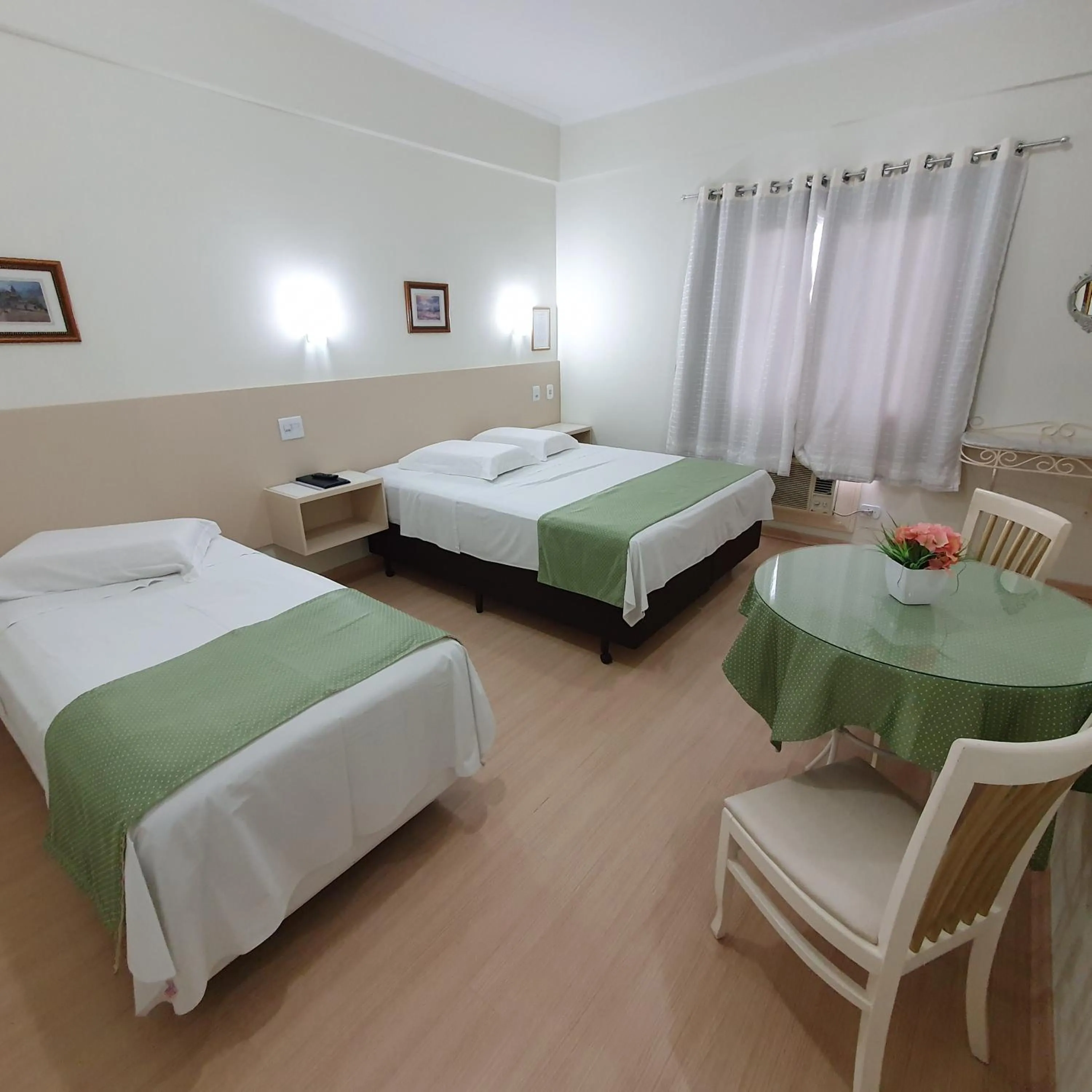 Bed in Grand Ville Hotel