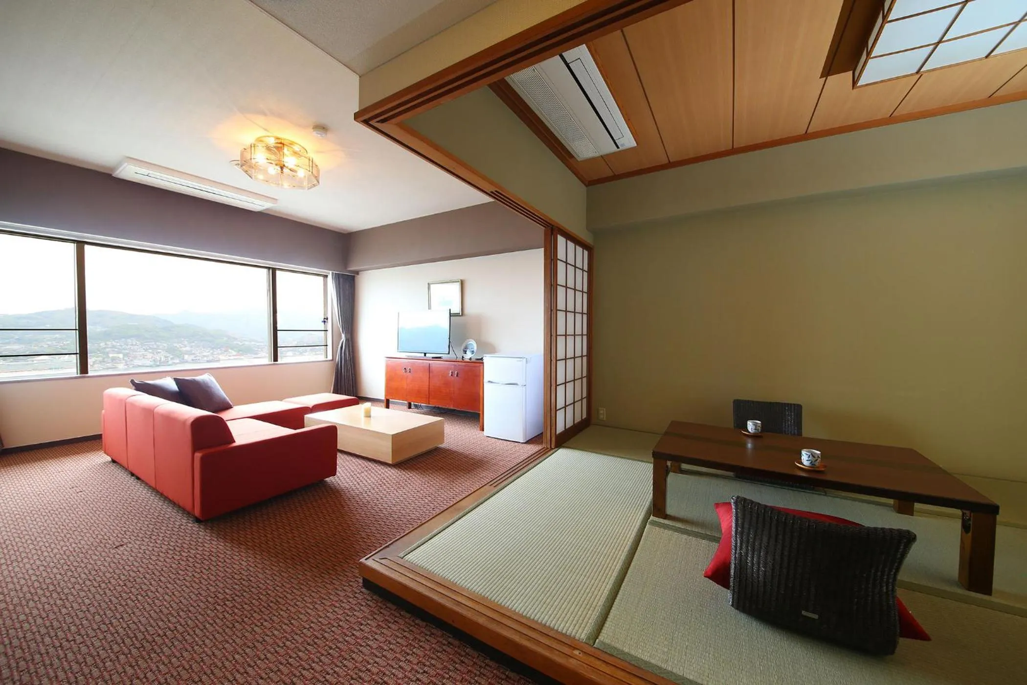 Bed in Ooedo Onsen Monogatari Nagasaki Hotel Seifu