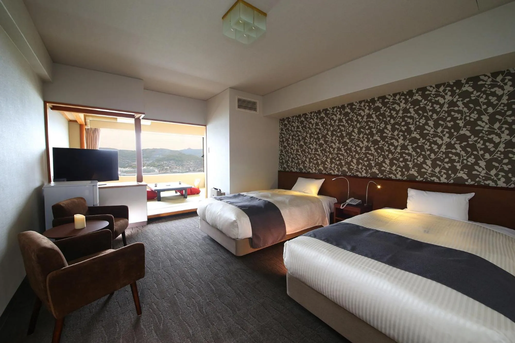 Photo of the whole room, Bed in Ooedo Onsen Monogatari Nagasaki Hotel Seifu