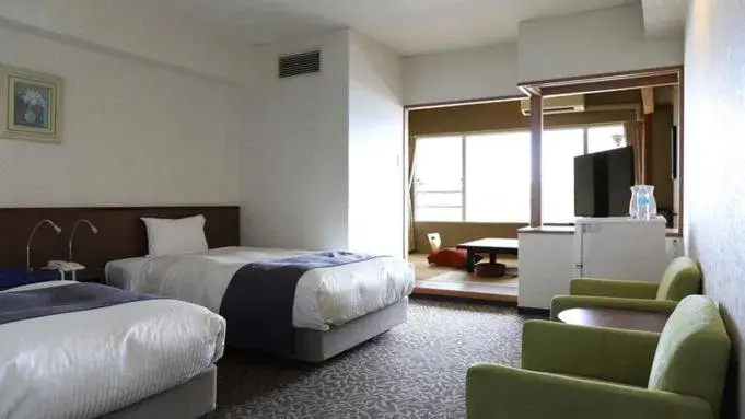 Superior Twin Room with Tatami Area - City Night View - Non-Smoking - Private Bathroom in Ooedo Onsen Monogatari Nagasaki Hotel Seifu Superior Twin Room with Tatami Area - City Night View - Non-Smoking - Private Bathroom in Ooedo Onsen Monogatari Nagasaki Hotel Seifu