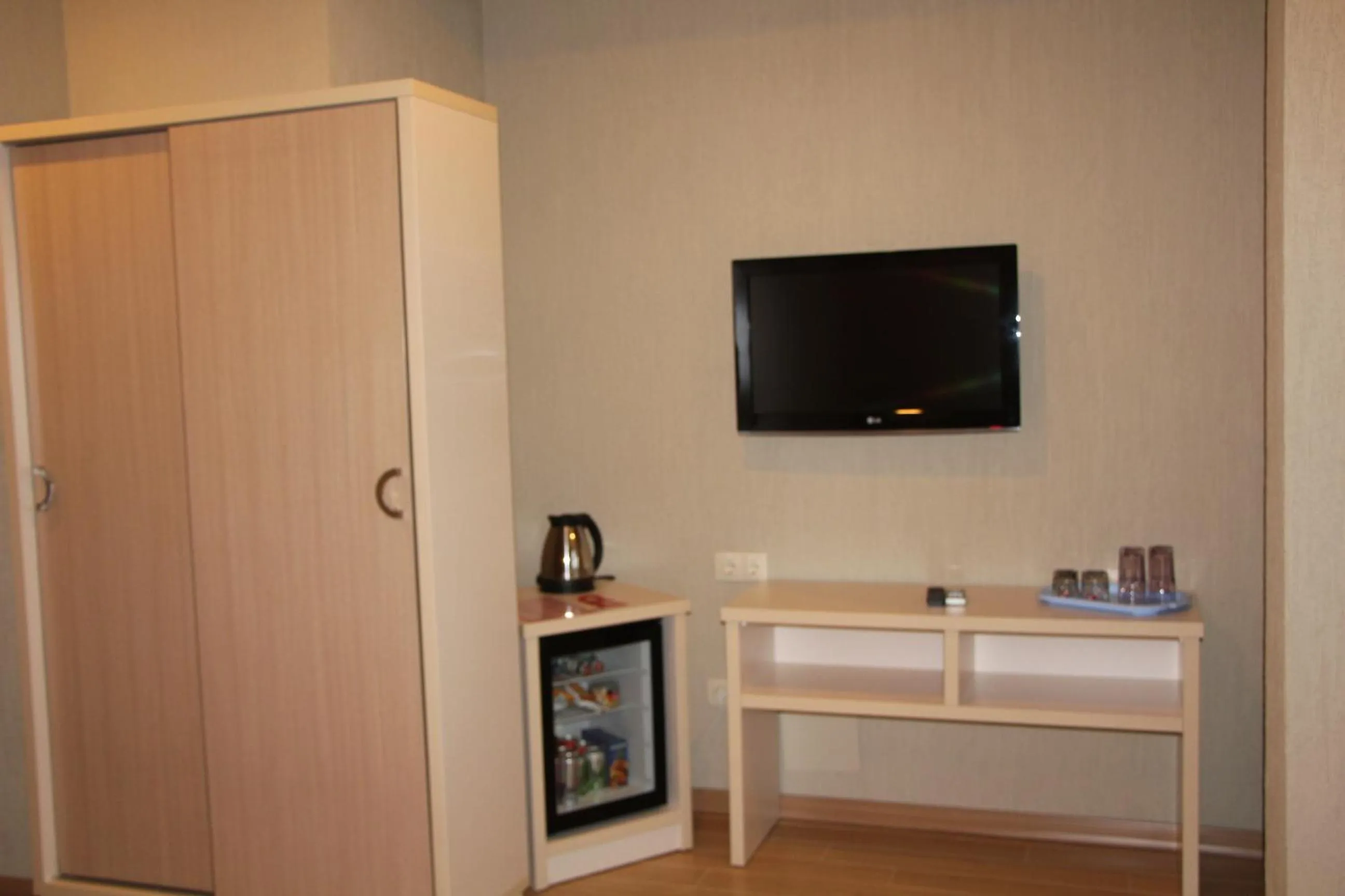 Bedroom in Legacy Hotel