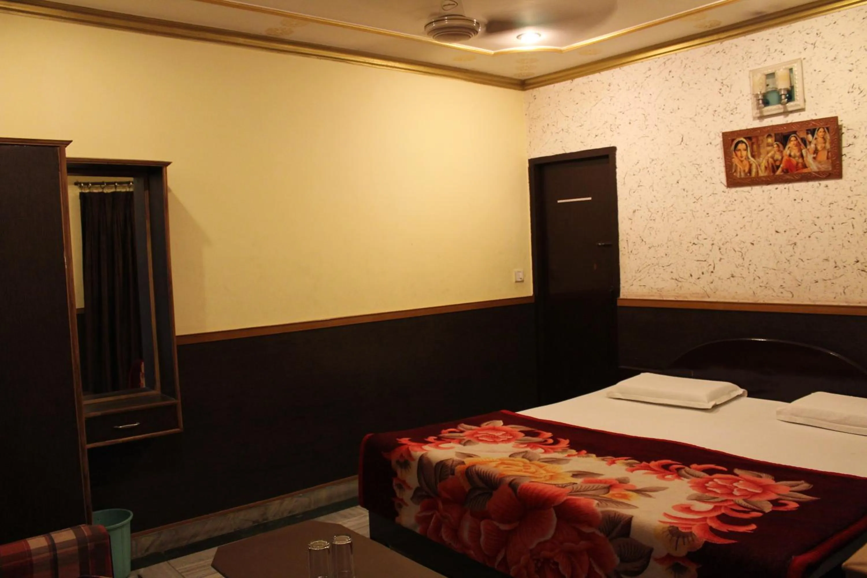 Bed in Hotel Ajay International