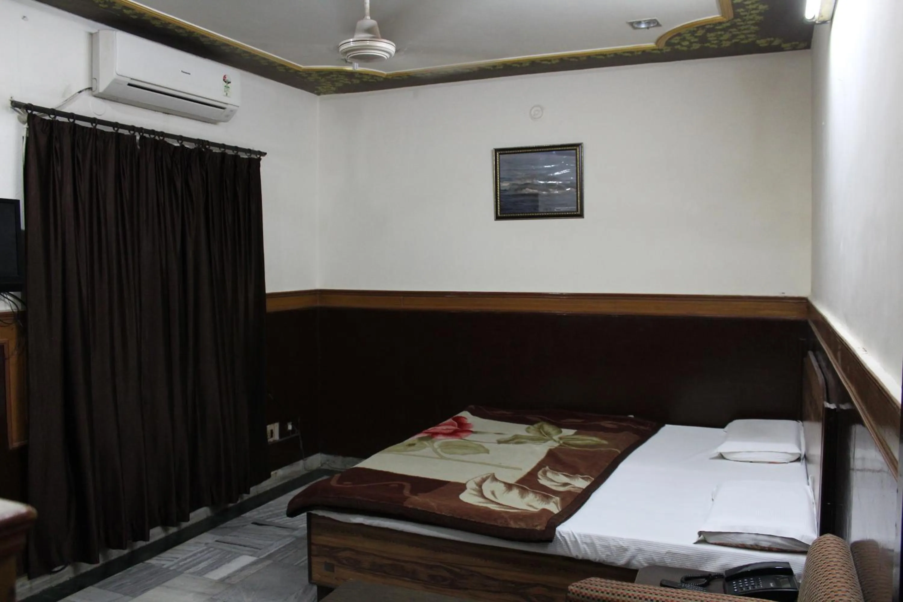 Bed in Hotel Ajay International