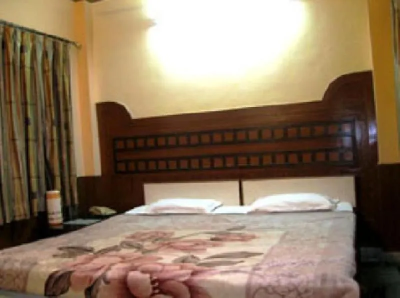 Bed in Hotel Ajay International