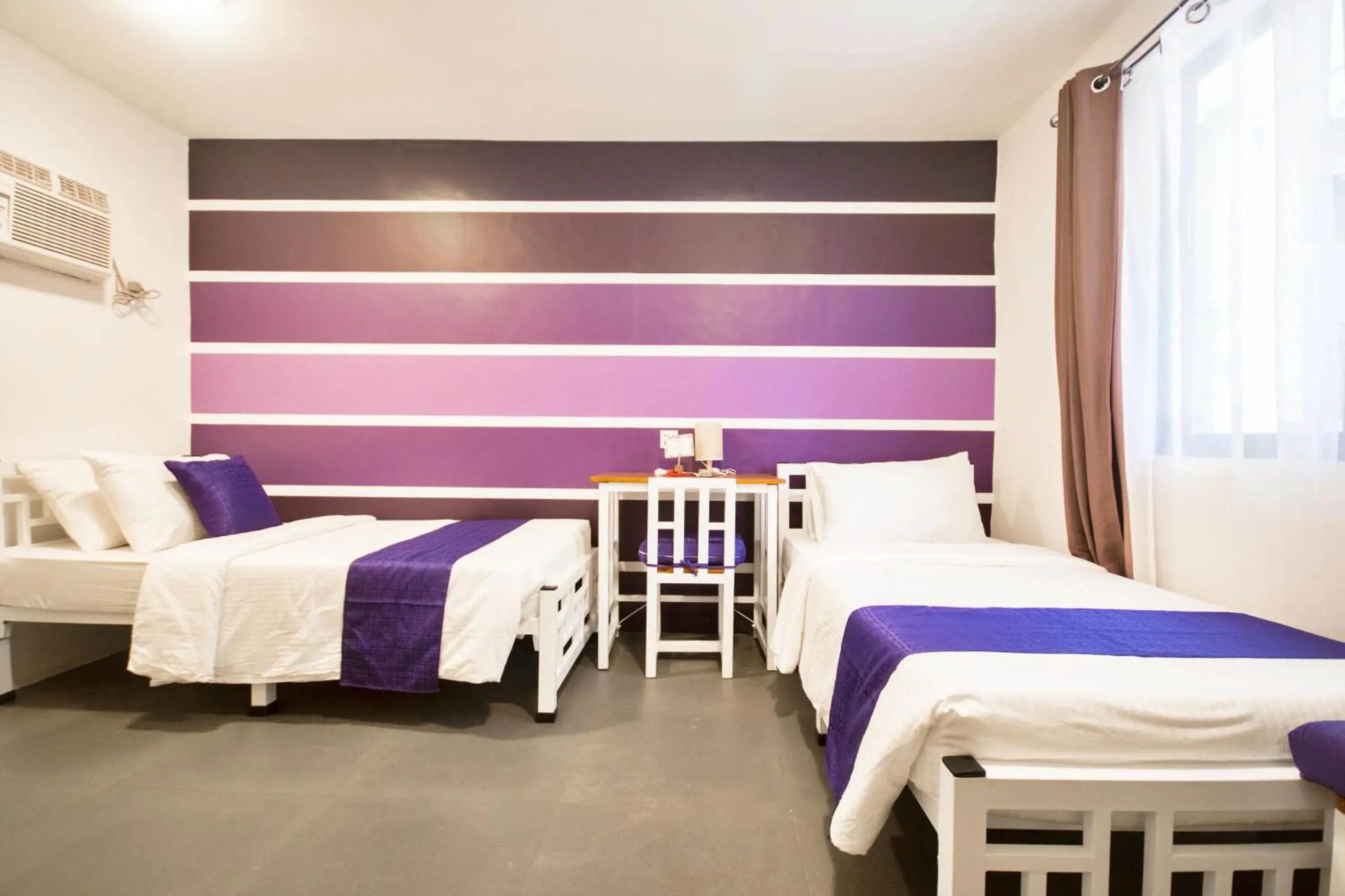 Deluxe Purple Twin Room in 8 Colors Beach House Resort Deluxe Purple Twin Room in 8 Colors Beach House Resort
