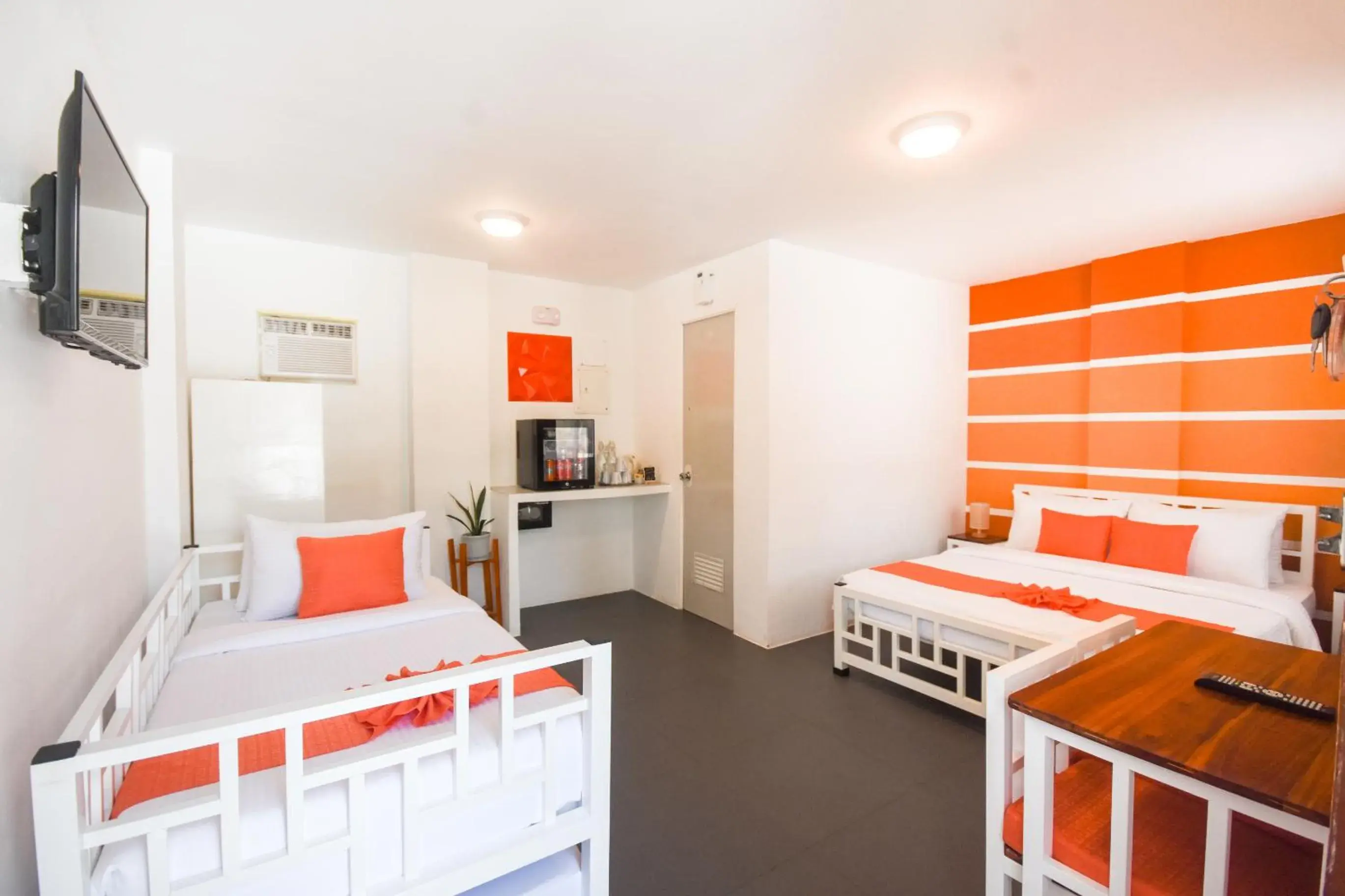 Studio Triple Orange Room in 8 Colors Beach House Resort Studio Triple Orange Room in 8 Colors Beach House Resort