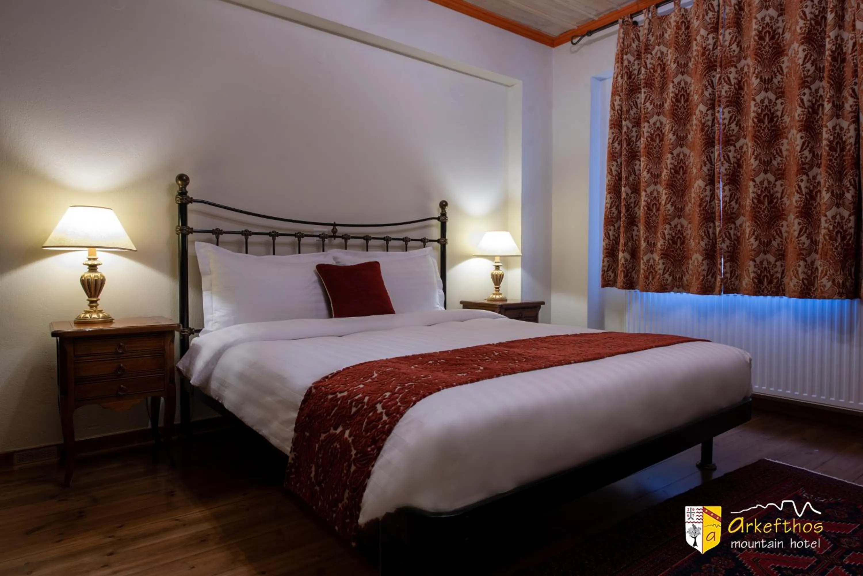 Bed in Arkefthos Mountain Hotel