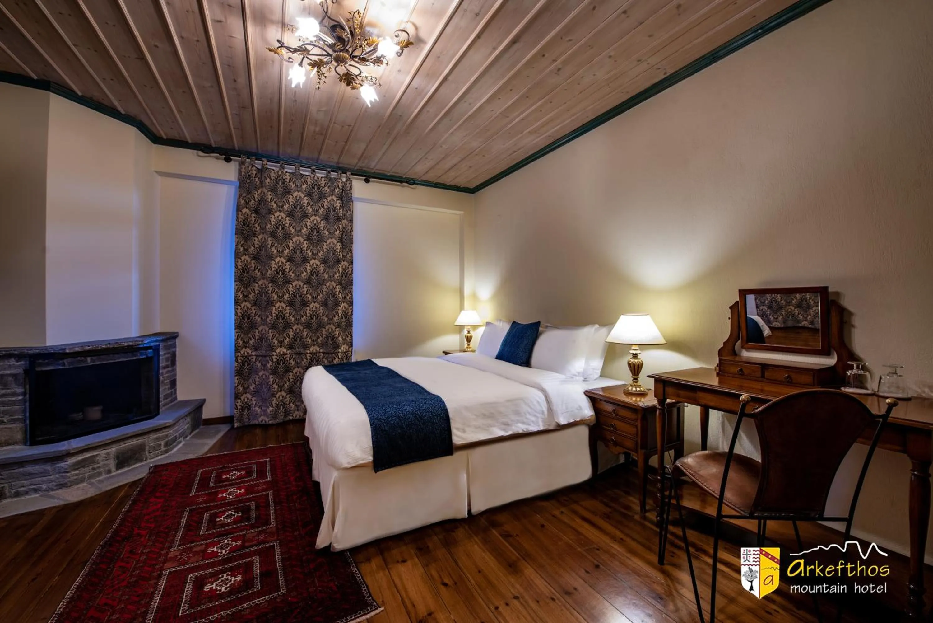 Bed in Arkefthos Mountain Hotel