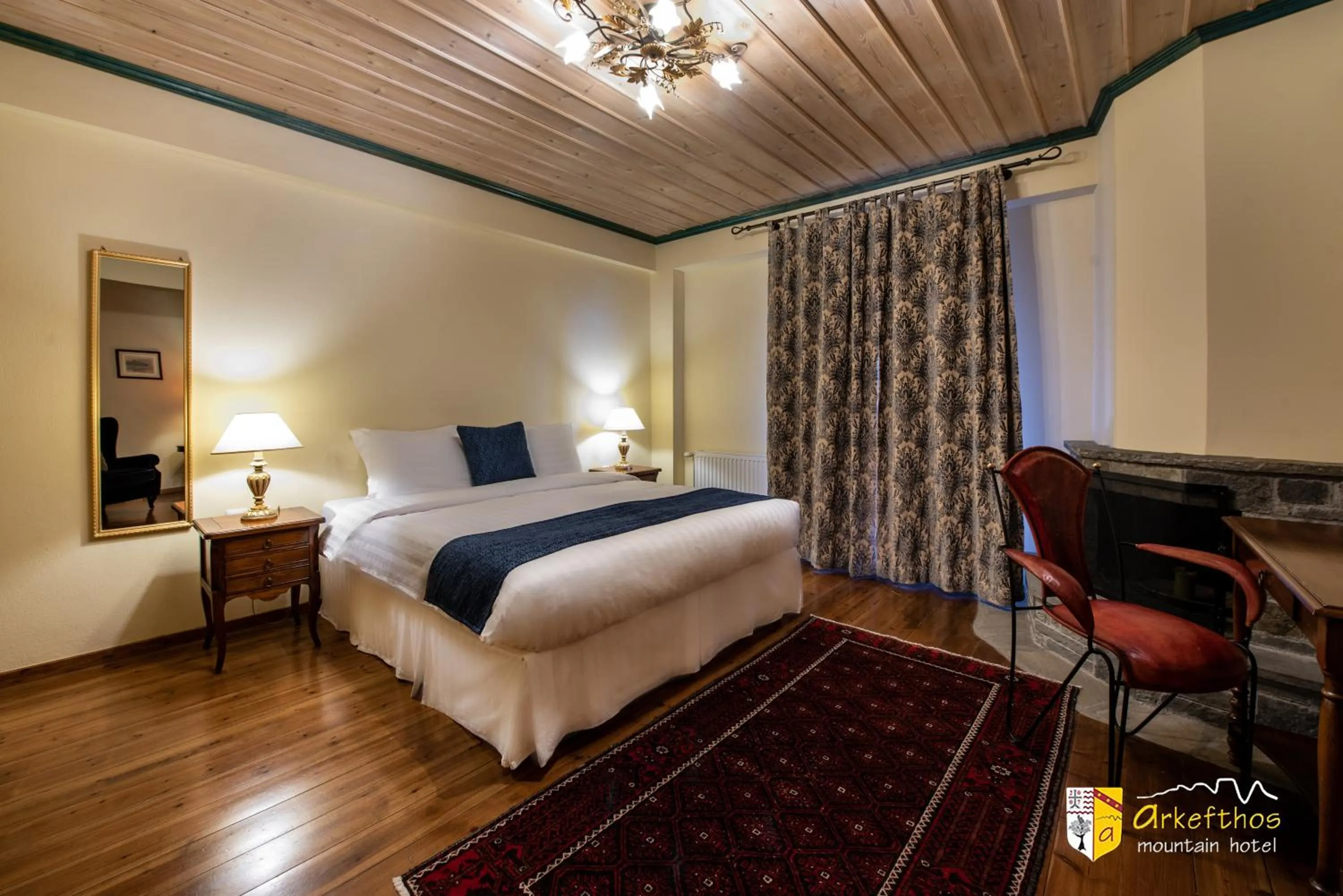 Bed in Arkefthos Mountain Hotel