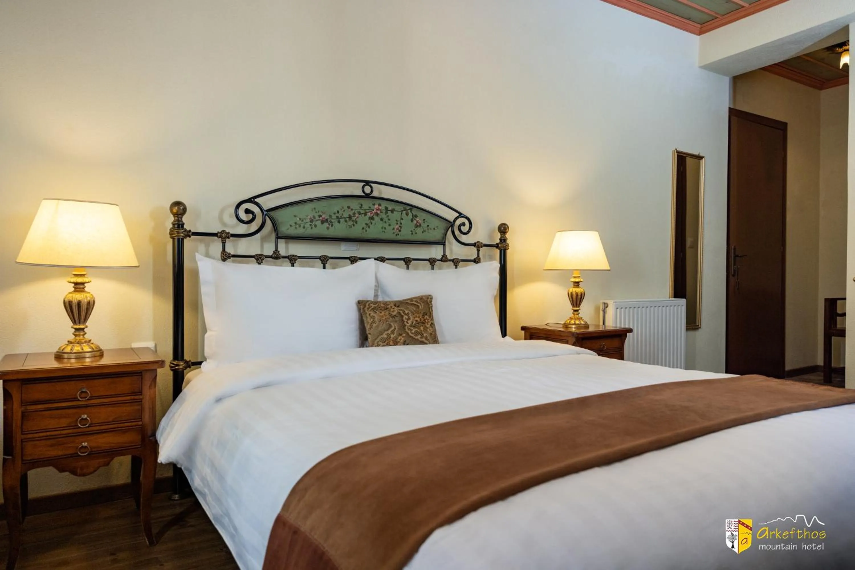 Bed in Arkefthos Mountain Hotel