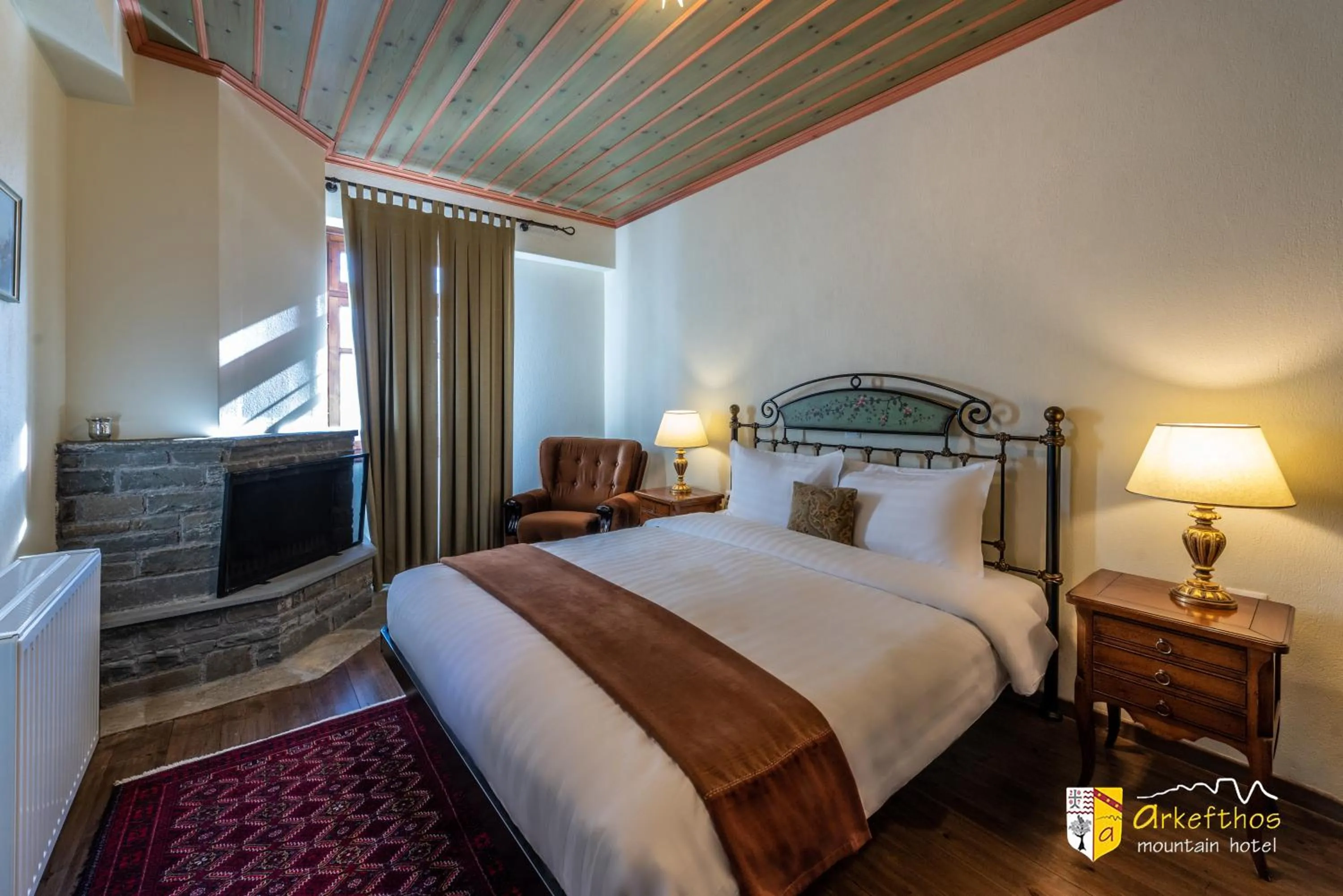 Bed in Arkefthos Mountain Hotel