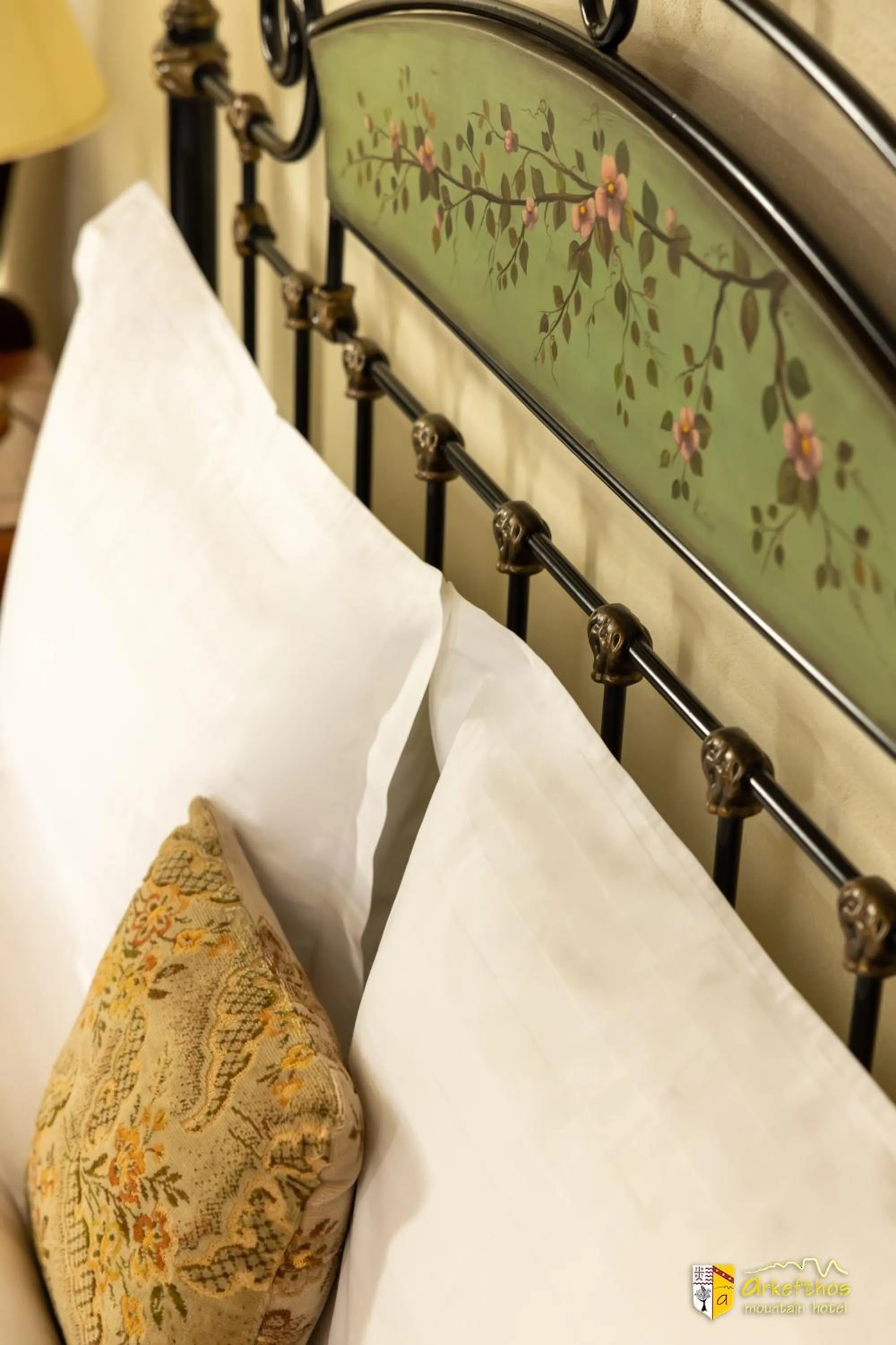 Bed in Arkefthos Mountain Hotel