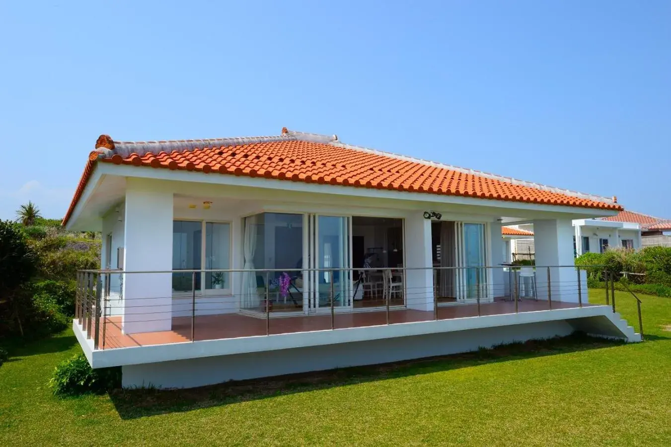 Facade/entrance in wisteria Ocean Nakijin Facade/entrance in wisteria Ocean Nakijin