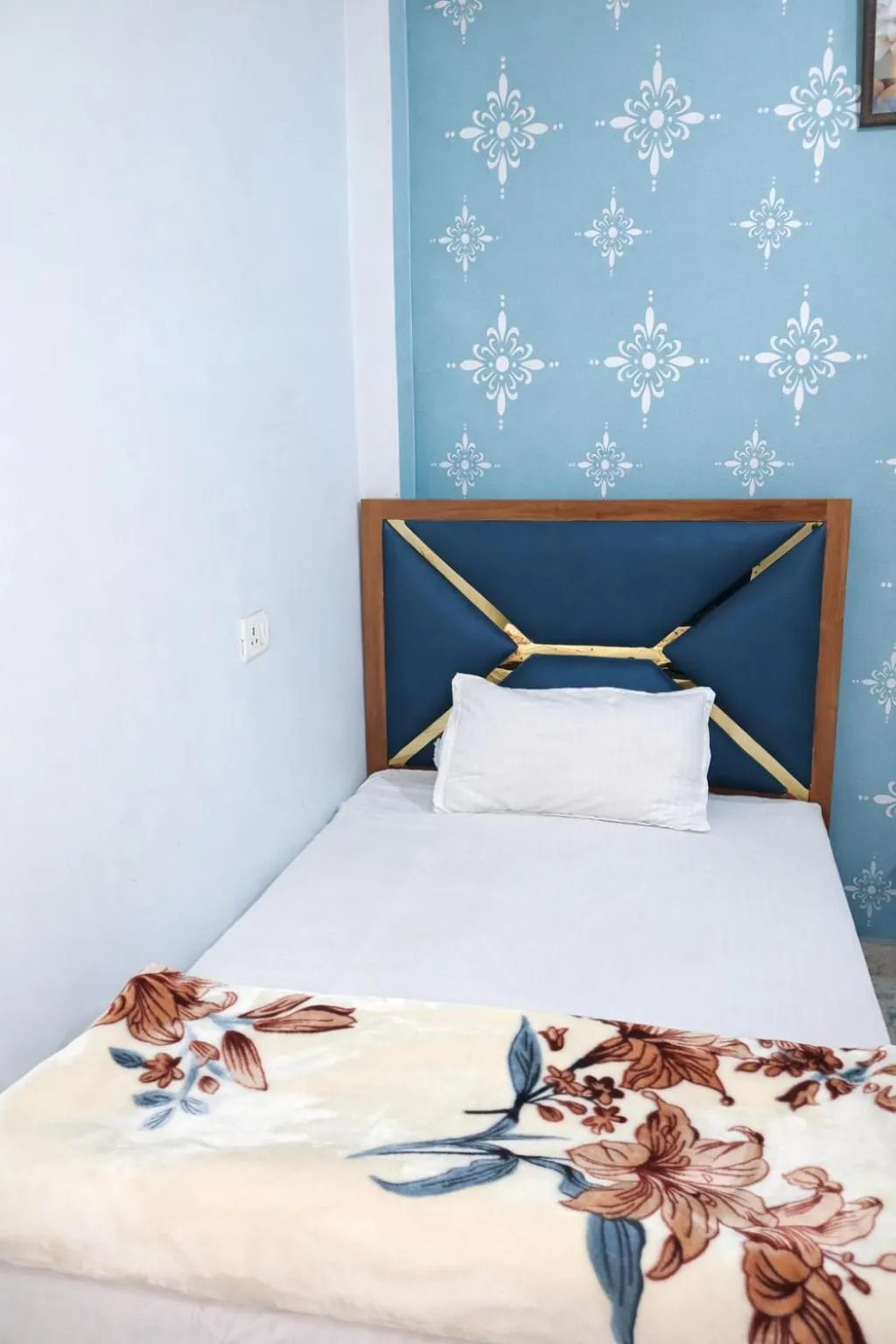 Bed in Mahamaya Guest House