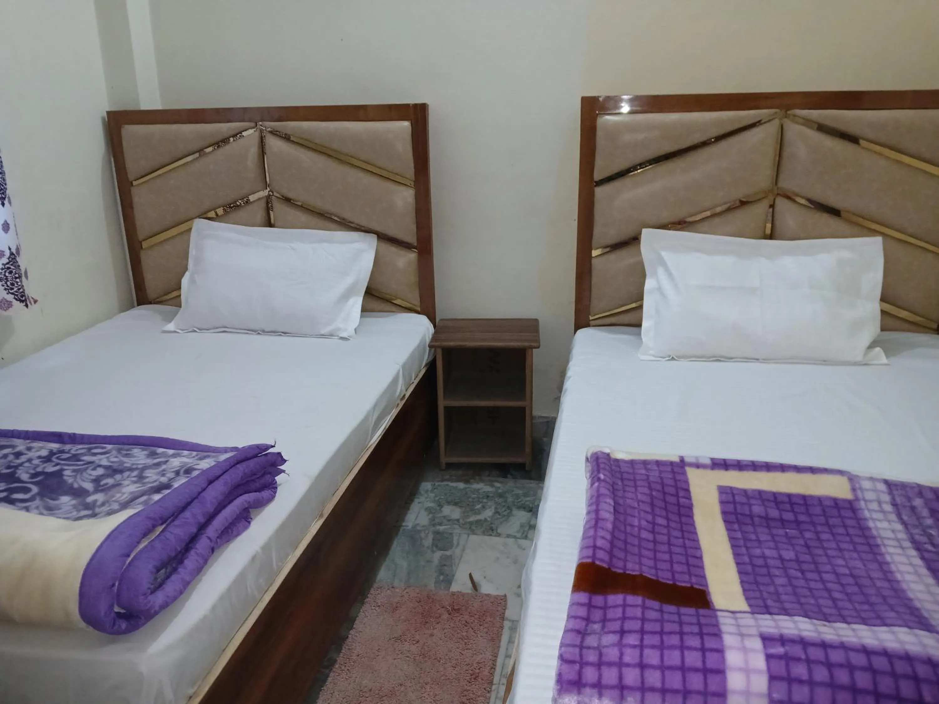 Bed in Mahamaya Guest House