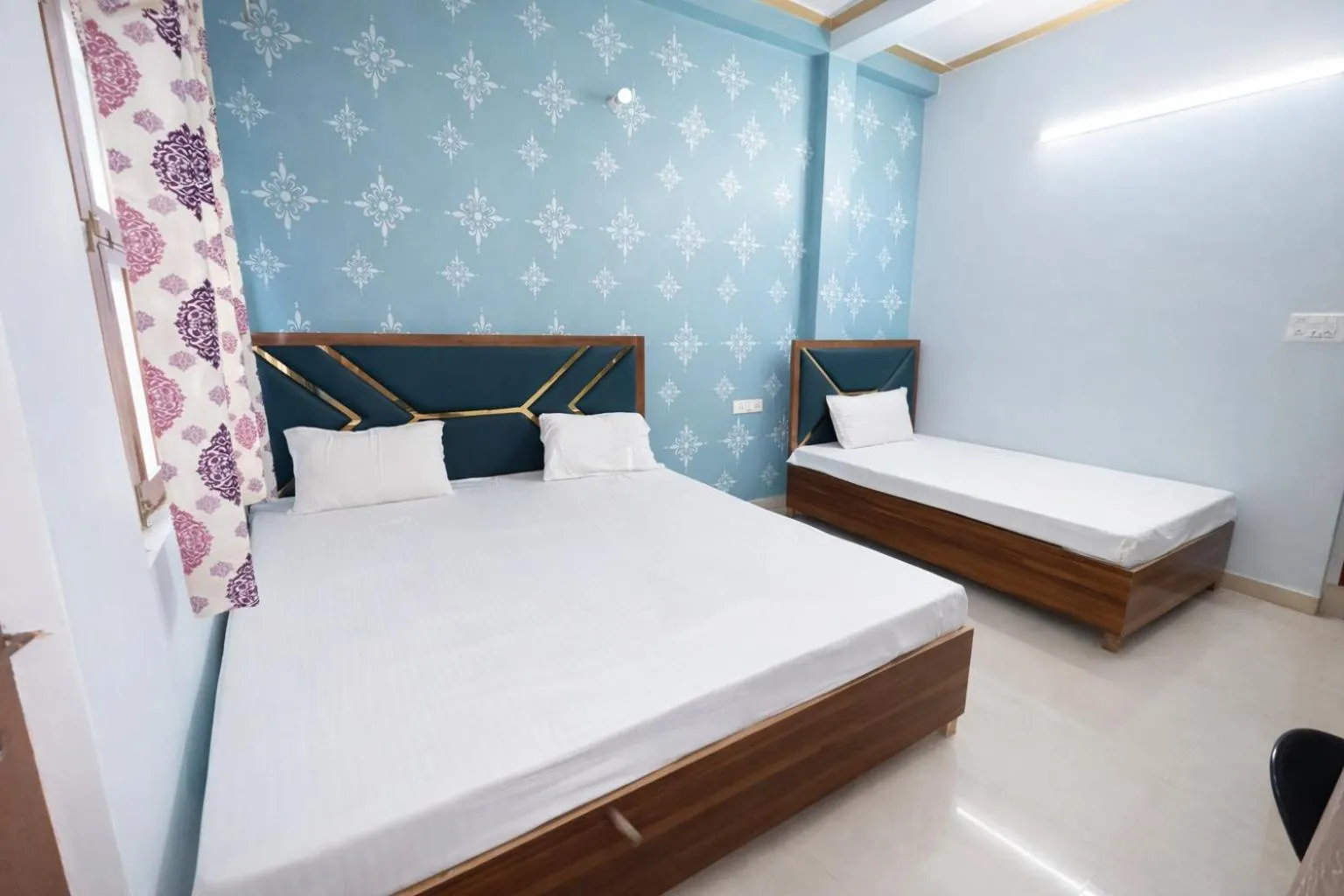 Bed in Mahamaya Guest House