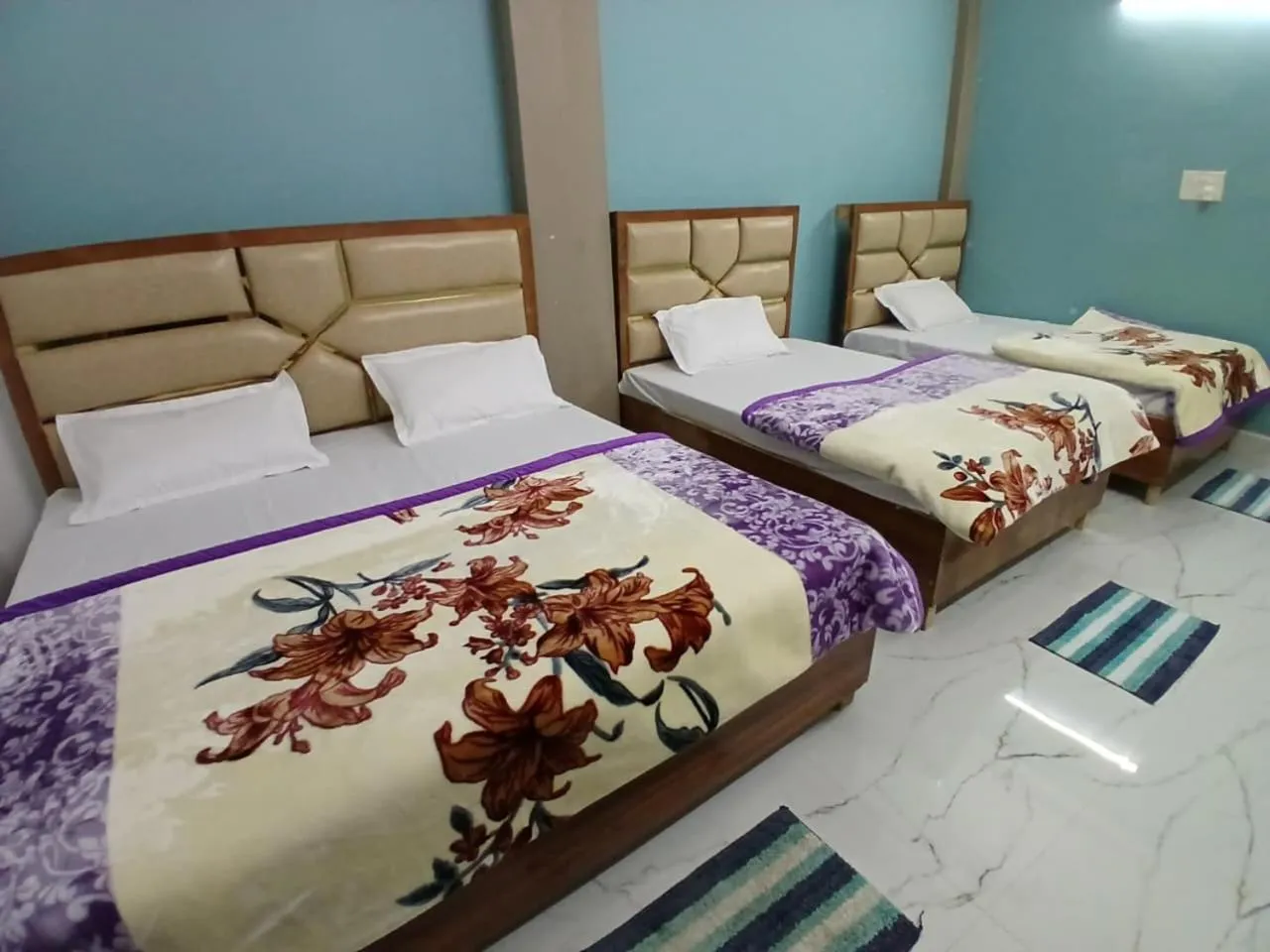 Bed in Mahamaya Guest House