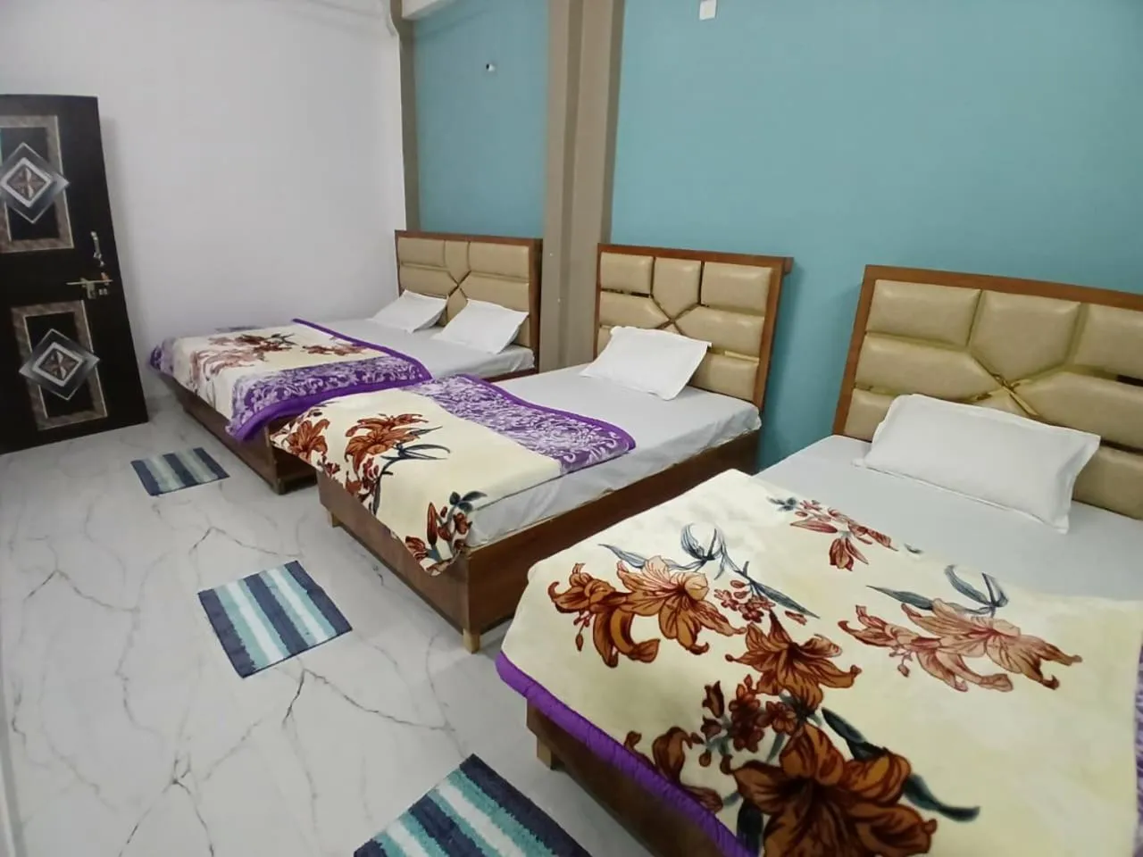 Bed in Mahamaya Guest House