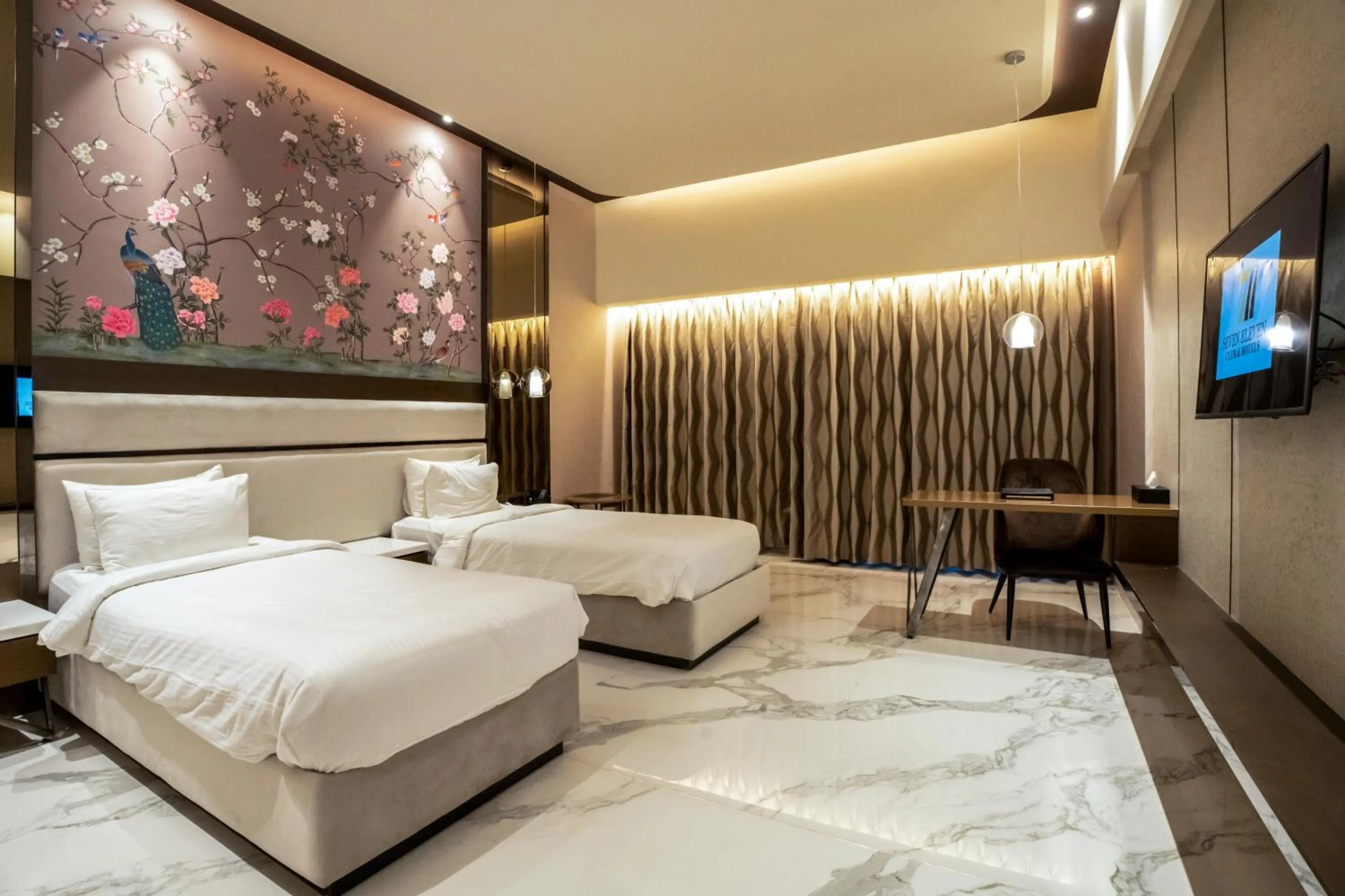 Bed in Seven Eleven Hotels and Club