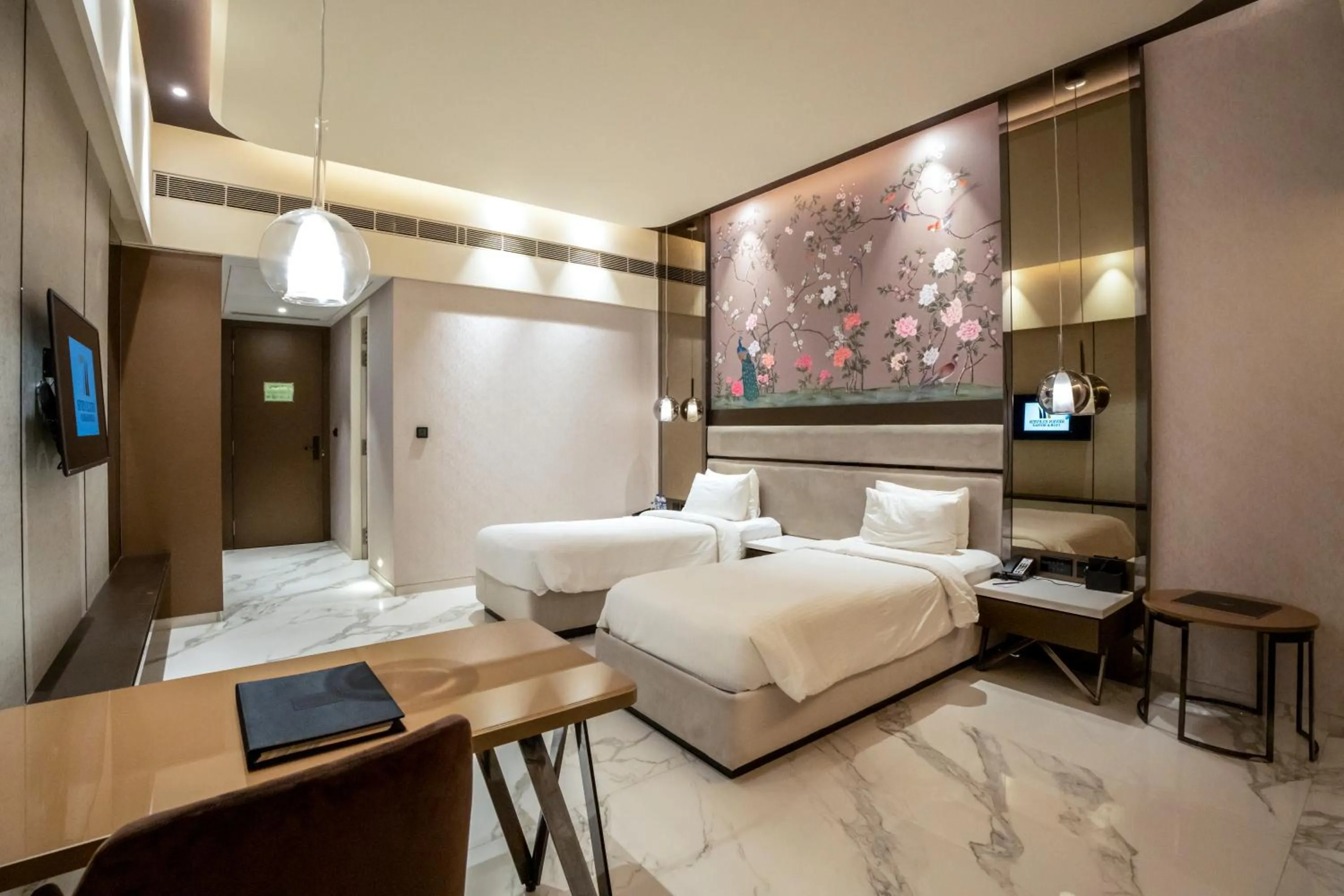 Bed in Seven Eleven Hotels and Club